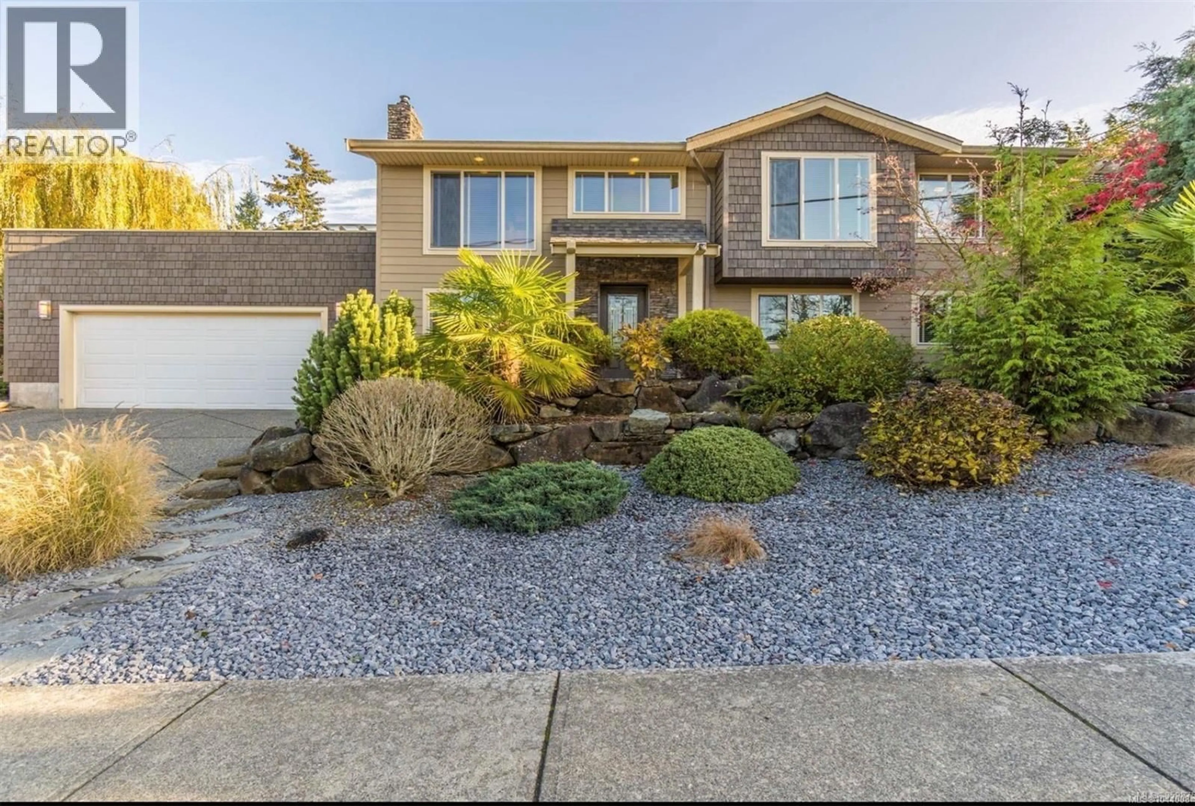 Home with vinyl exterior material, street for 5675 TURNER ROAD, Nanaimo British Columbia V9T5N8