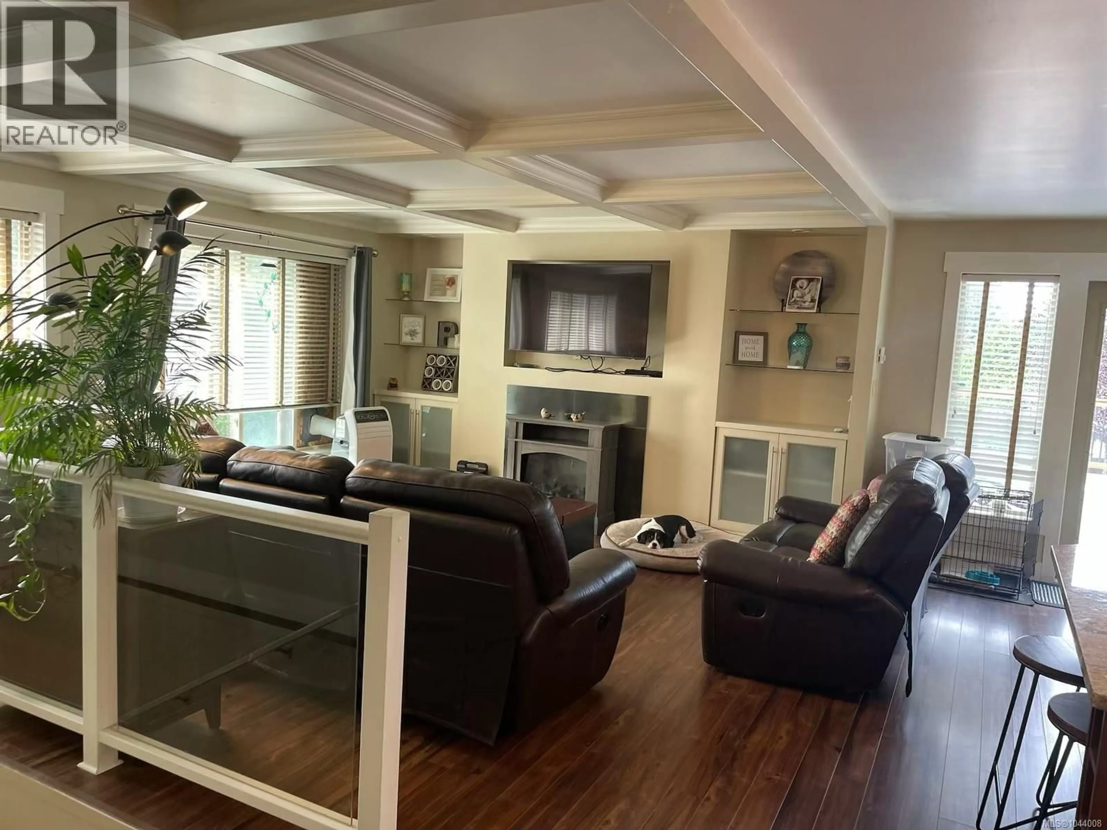 Living room with furniture, wood/laminate floor for 5675 TURNER ROAD, Nanaimo British Columbia V9T5N8