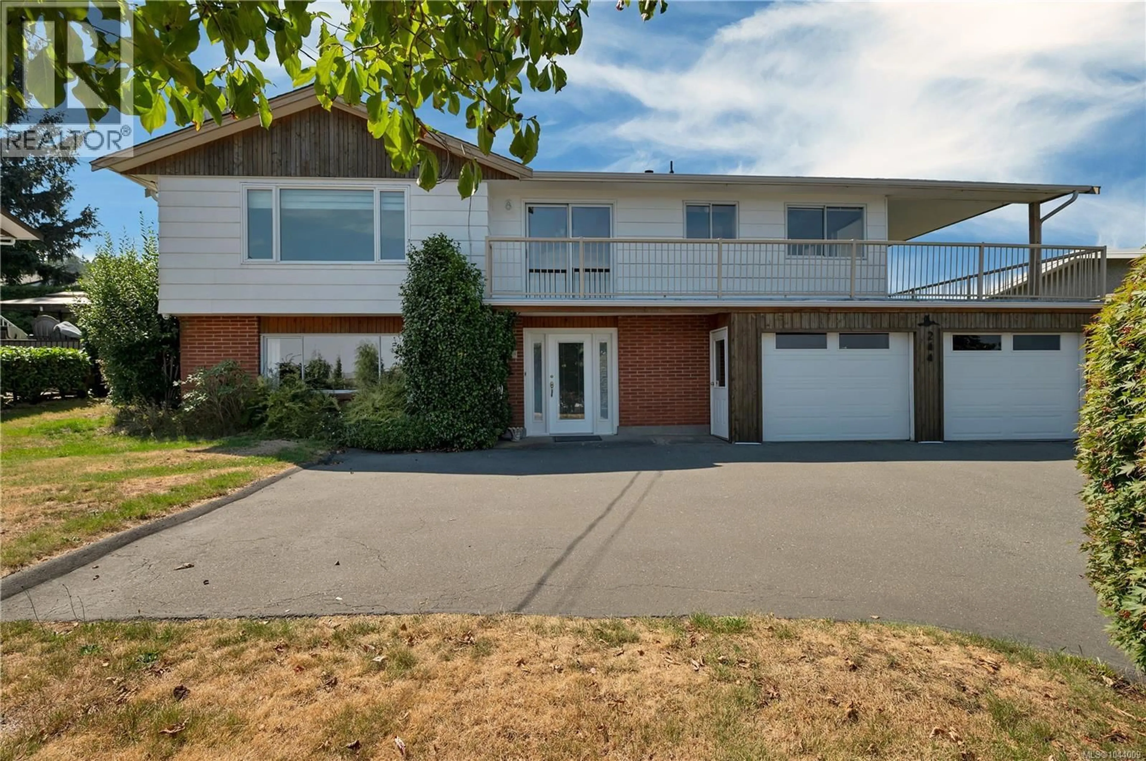 Home with vinyl exterior material, street for 244 ALDER STREET SOUTH, Campbell River British Columbia V9W2N1