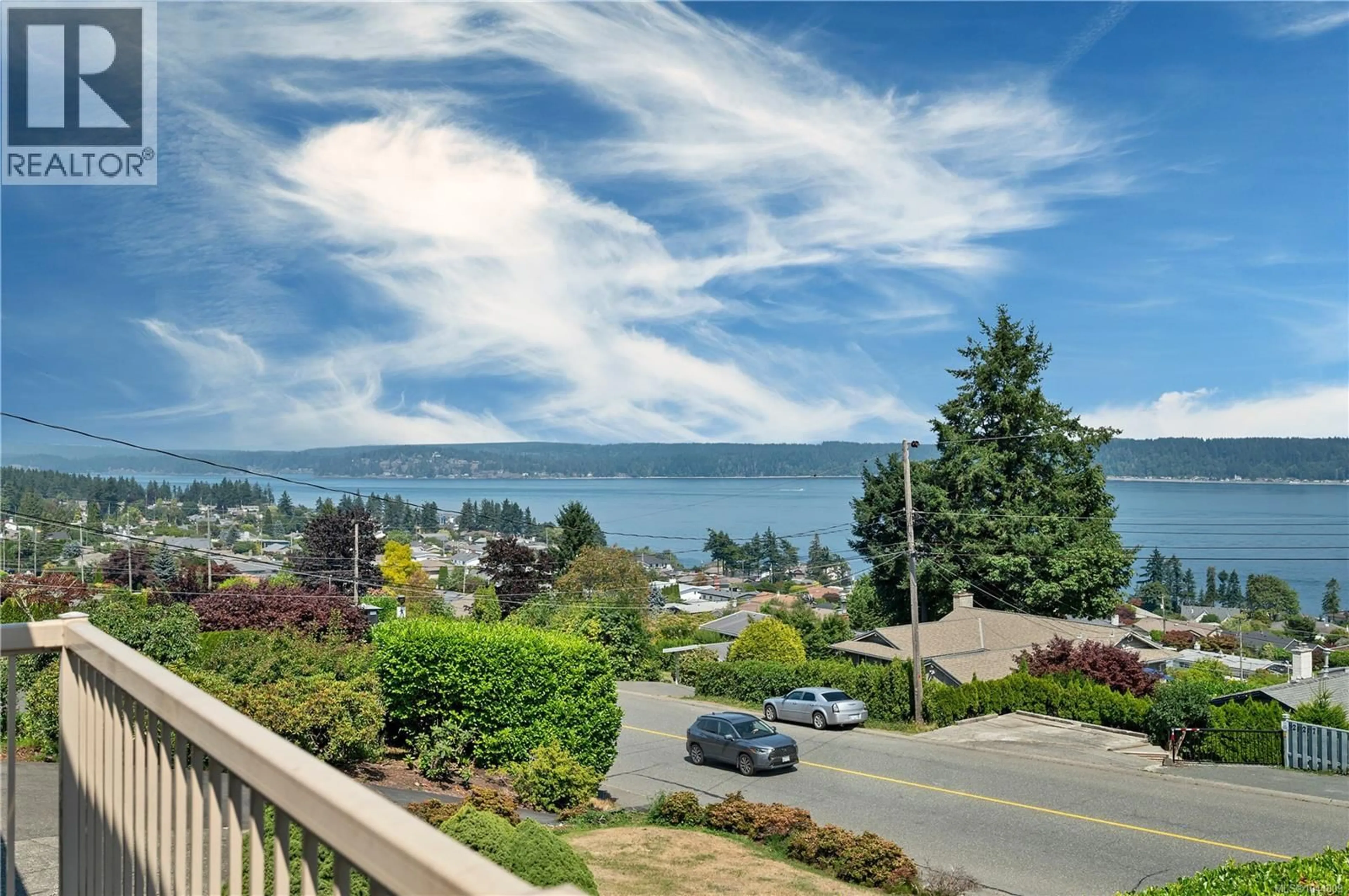A pic from outside/outdoor area/front of a property/back of a property/a pic from drone, water/lake/river/ocean view for 244 ALDER STREET SOUTH, Campbell River British Columbia V9W2N1