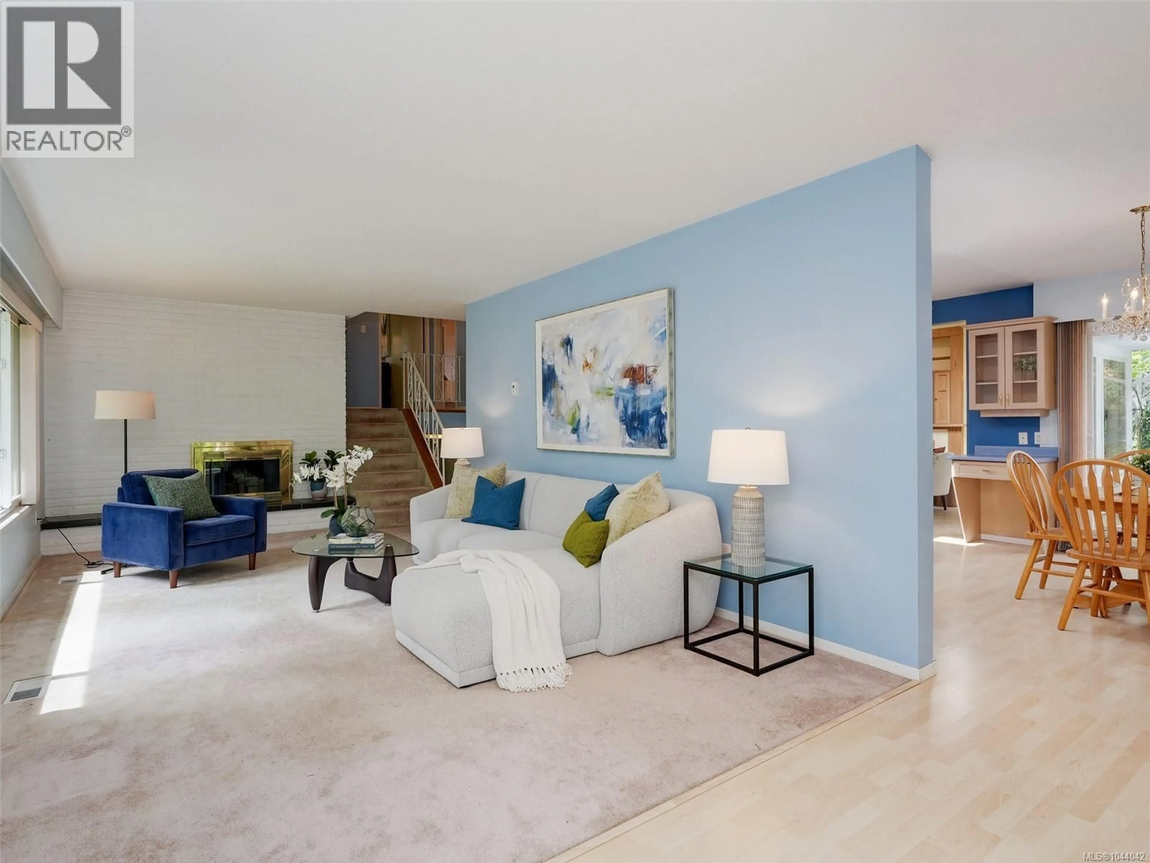 Living room with furniture, unknown for 743 HELVETIA CRESCENT, Saanich British Columbia V8Y1M1