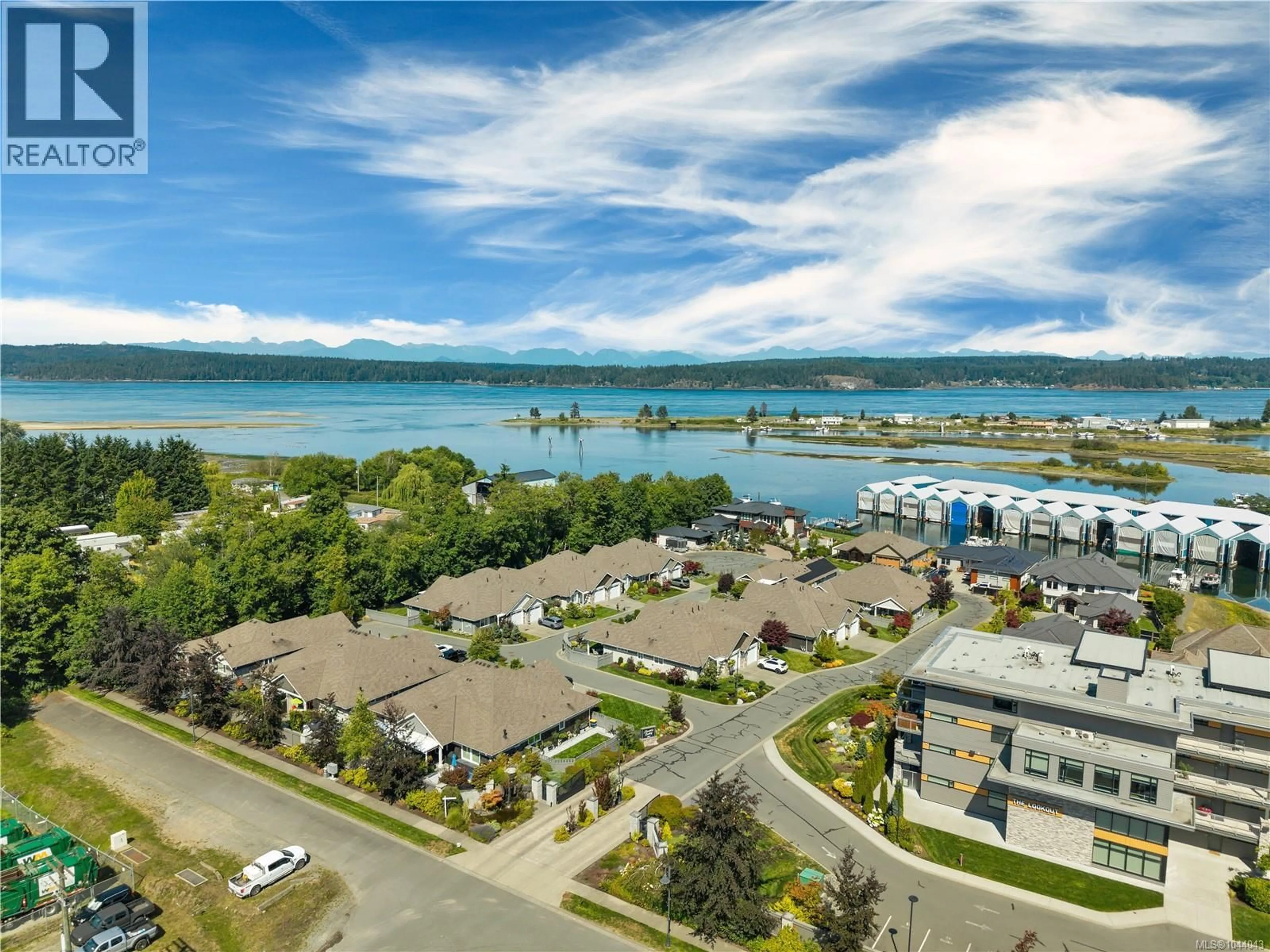 A pic from outside/outdoor area/front of a property/back of a property/a pic from drone, water/lake/river/ocean view for 18 - 2991 NORTH BEACH DRIVE, Campbell River British Columbia V9W0B5