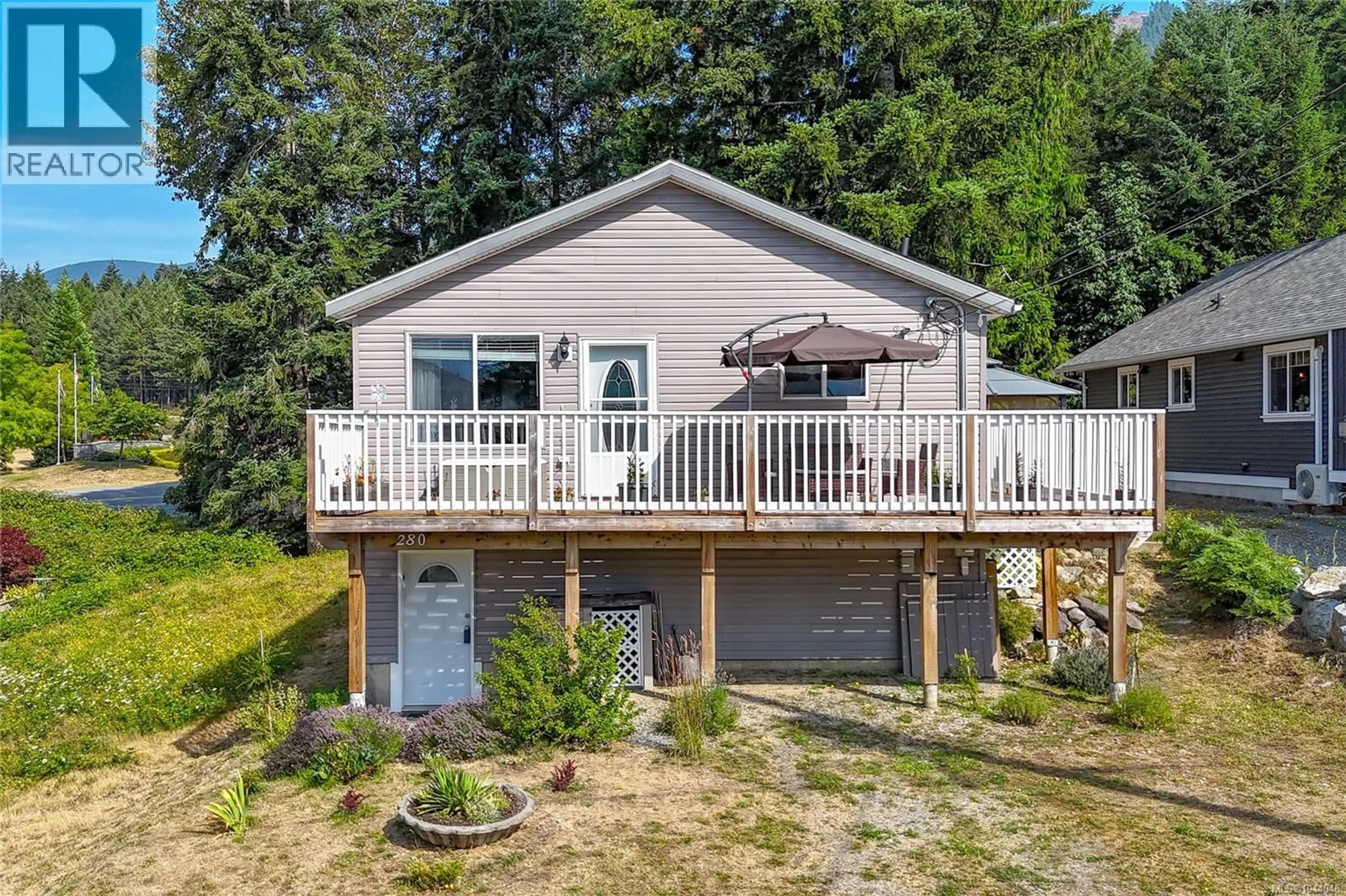 A pic from outside/outdoor area/front of a property/back of a property/a pic from drone, water/lake/river/ocean view for 280 LAKE PARK ROAD, Lake Cowichan British Columbia V0R2G0