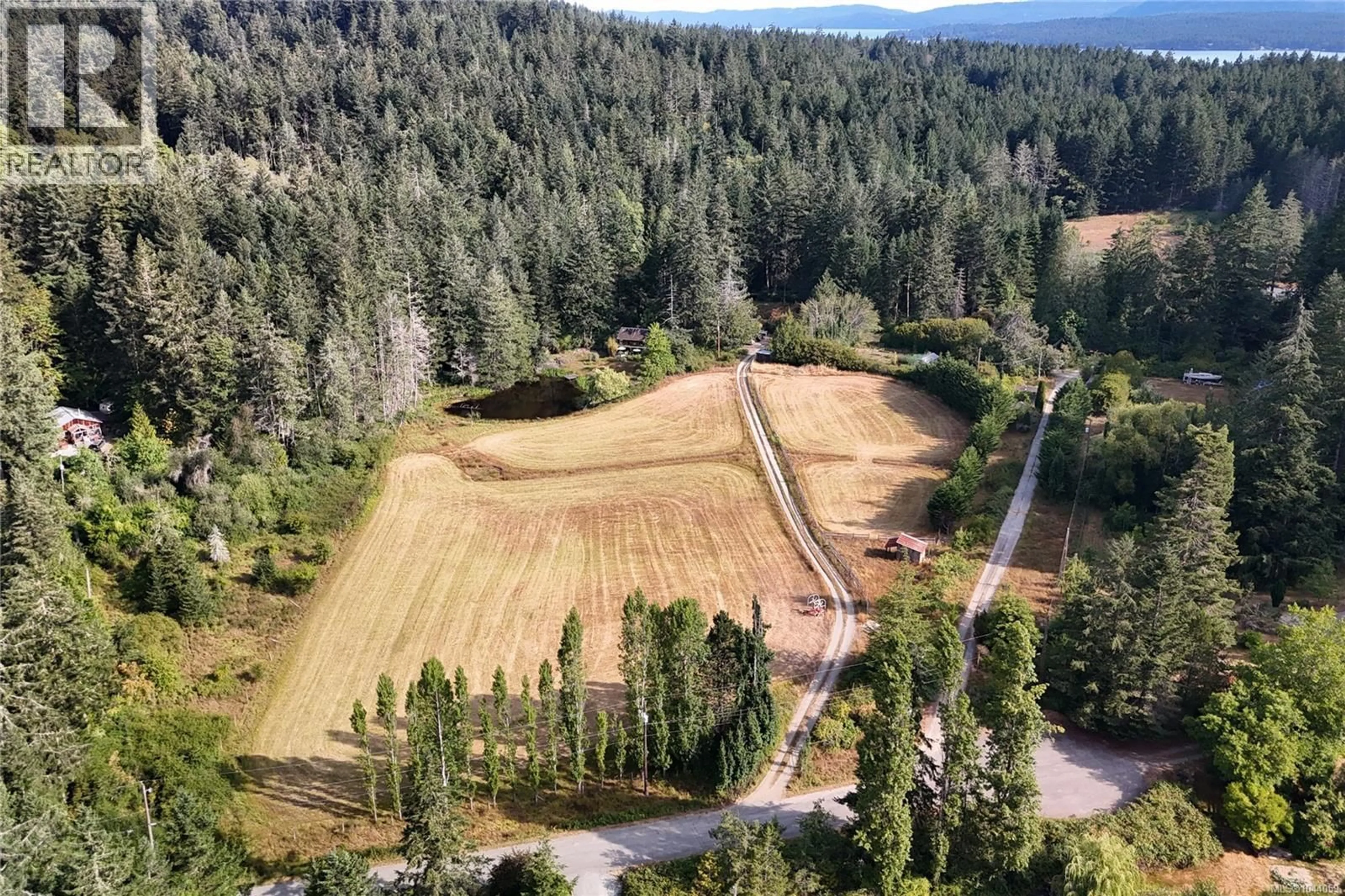 A pic from outside/outdoor area/front of a property/back of a property/a pic from drone, forest/trees view for 190 MCLENNAN DRIVE, Salt Spring British Columbia V8K1X2