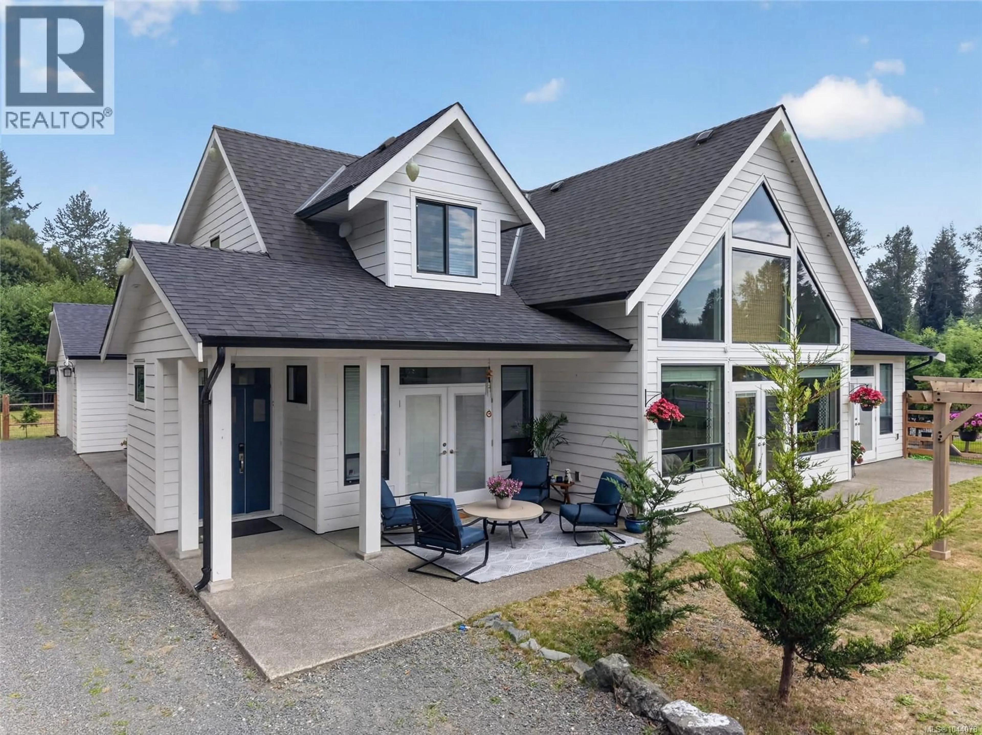 Home with vinyl exterior material, street for 8740 OYSTER RIVER WAY, Black Creek British Columbia V9J1K3