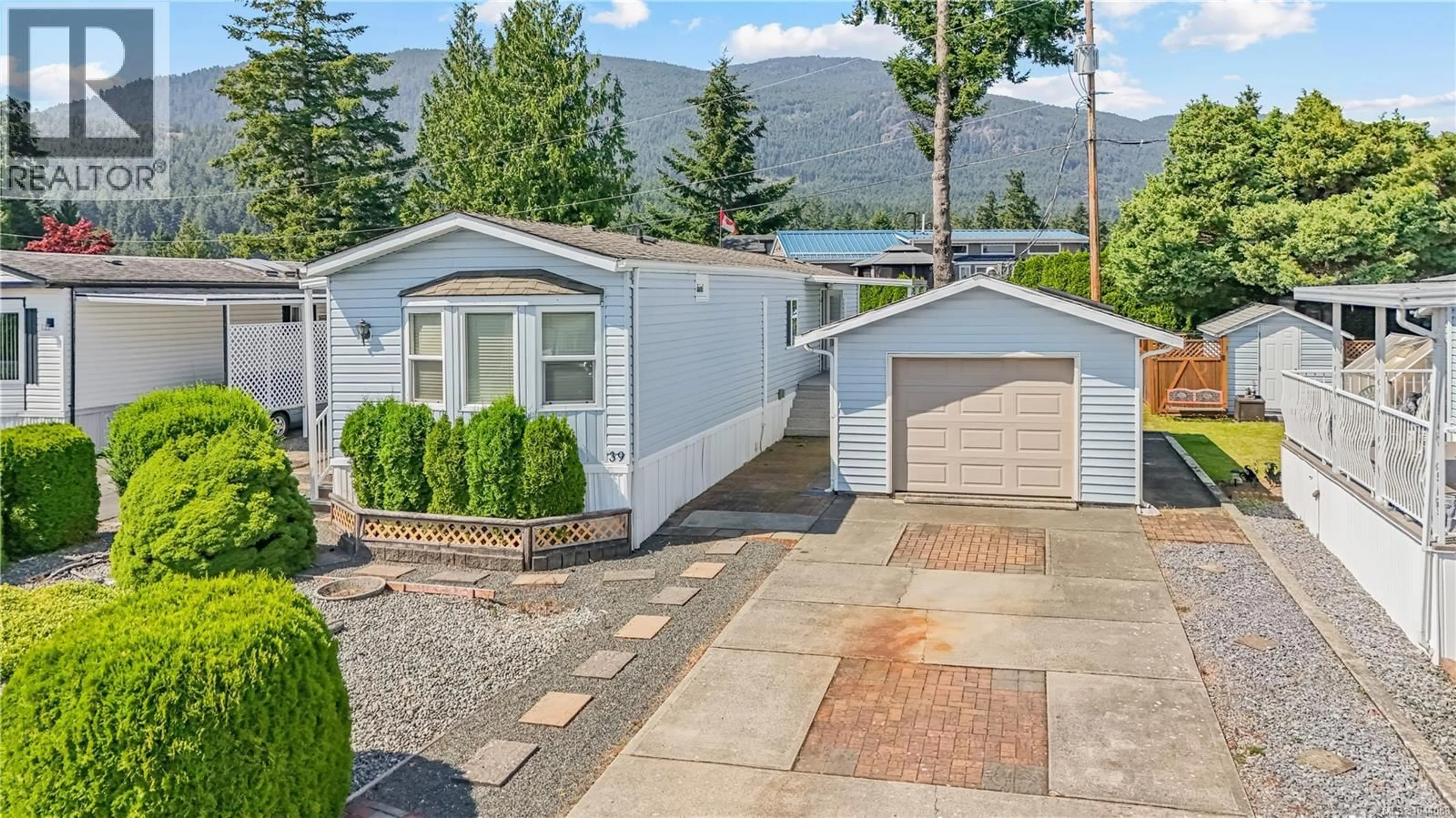 Home with vinyl exterior material, mountain view for 39 - 2301 ARBOT ROAD, Nanaimo British Columbia V9R6S7