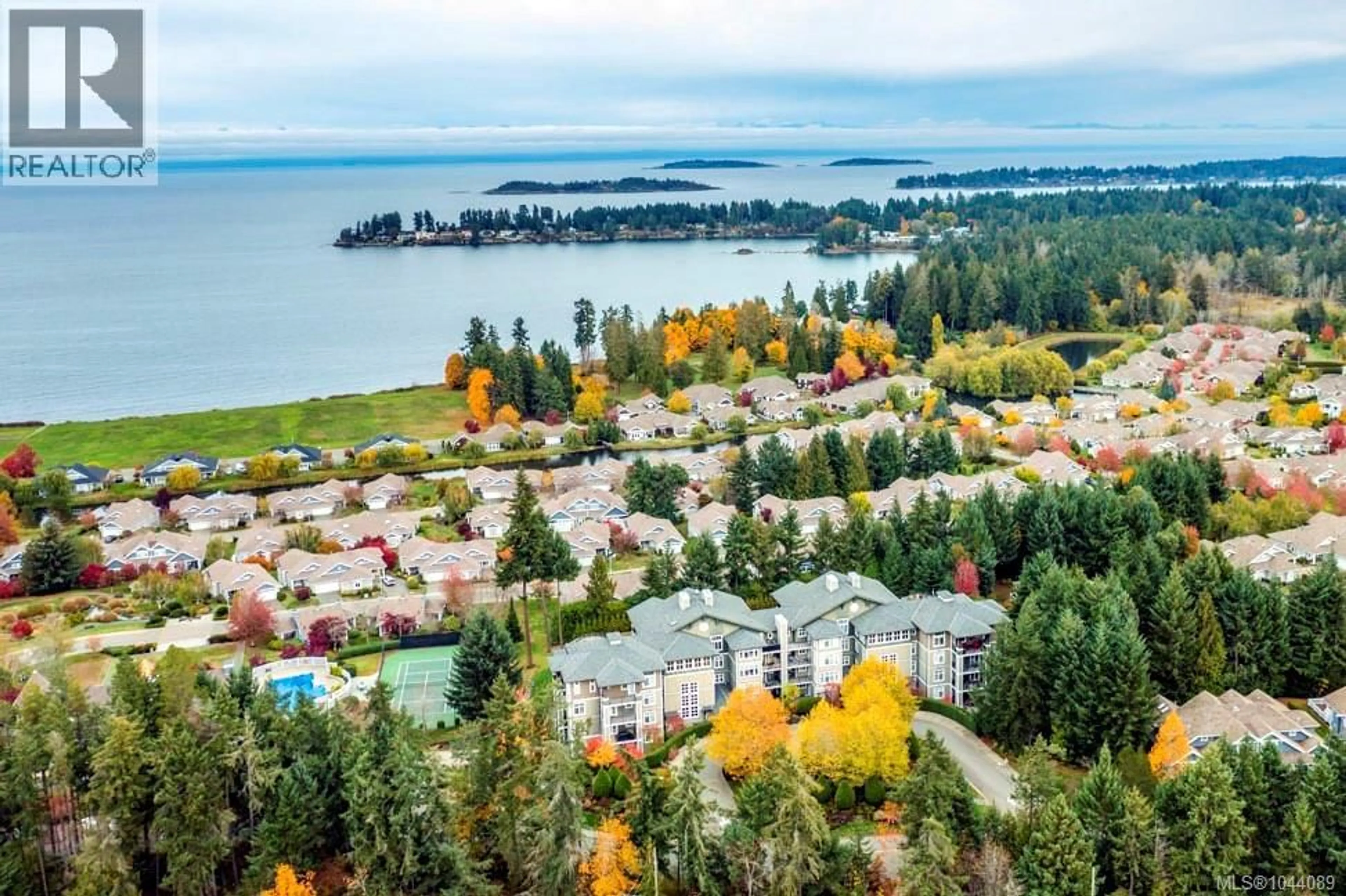 A pic from outside/outdoor area/front of a property/back of a property/a pic from drone, water/lake/river/ocean view for 101 - 1325 CAPE COD DRIVE, Parksville British Columbia V9P2Y8