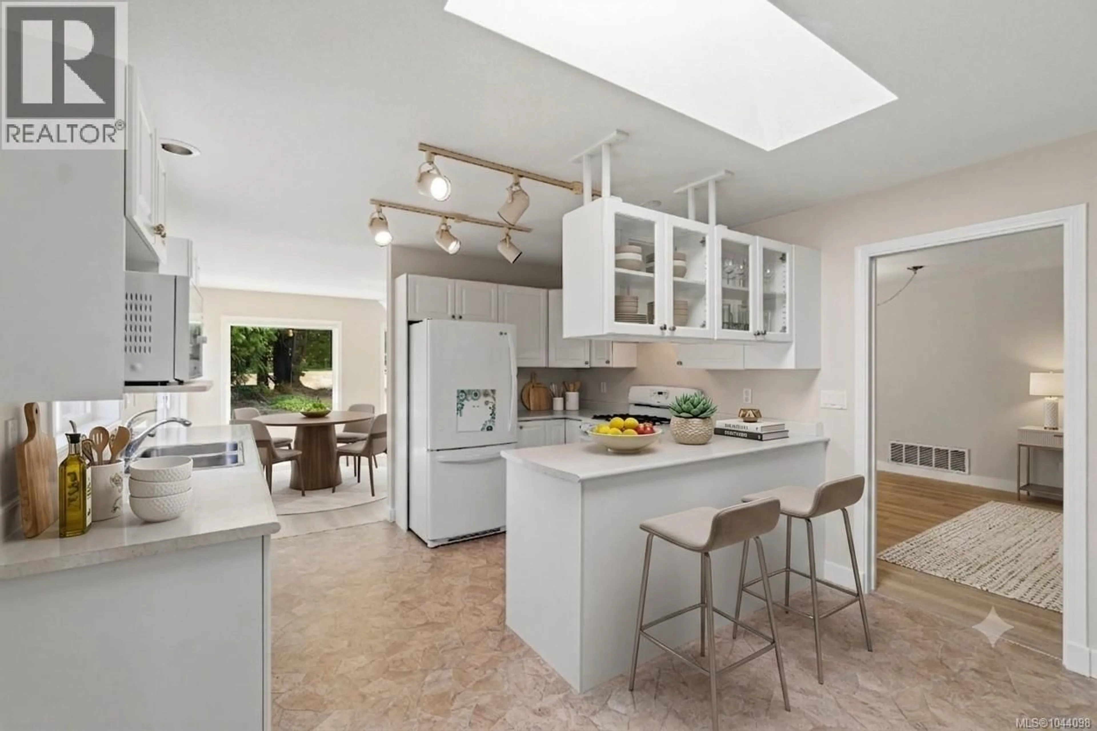 Open concept kitchen, ceramic/tile floor for 1325 LEEWARD WAY, Qualicum Beach British Columbia V9K2M1