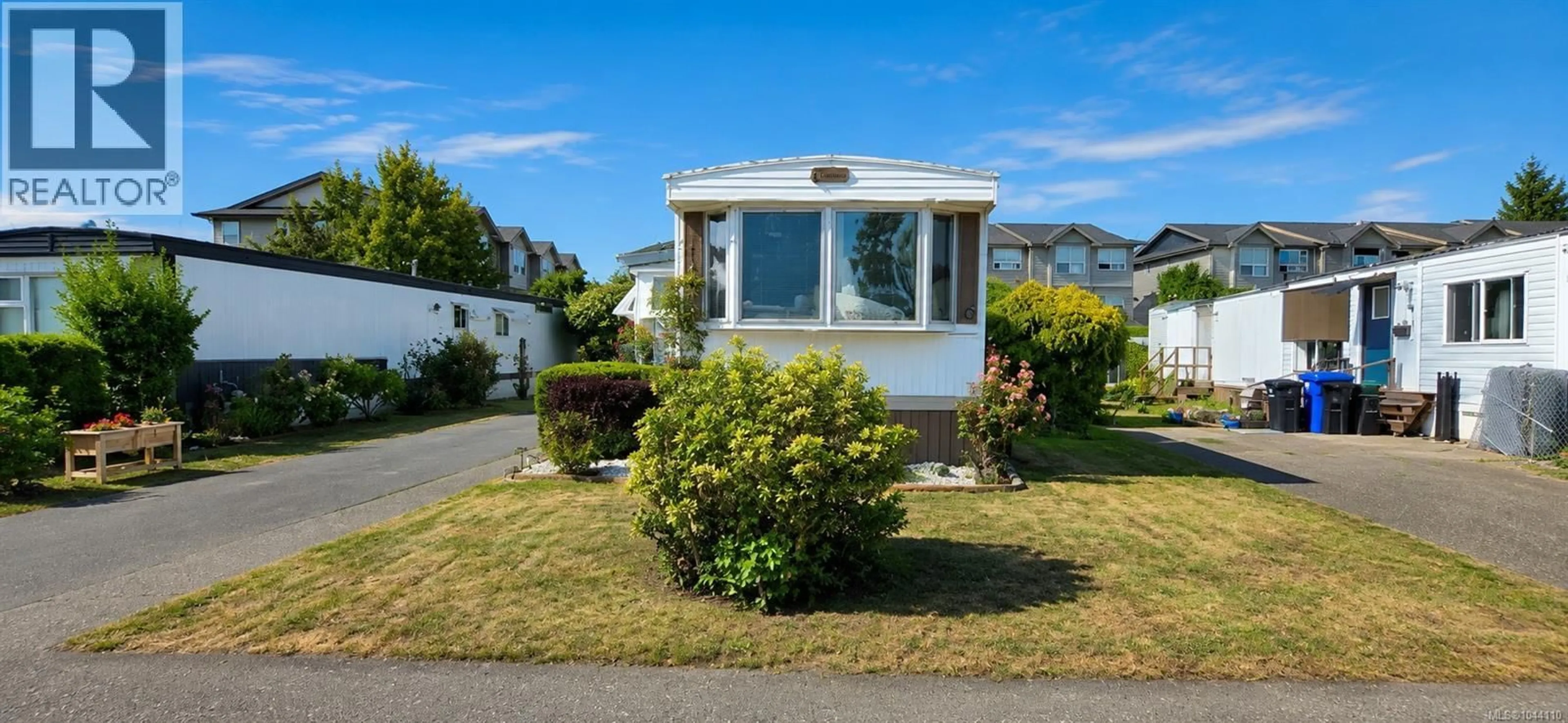 Home with vinyl exterior material, street for 6 - 2625 MANSFIELD DRIVE, Courtenay British Columbia V9N2M2