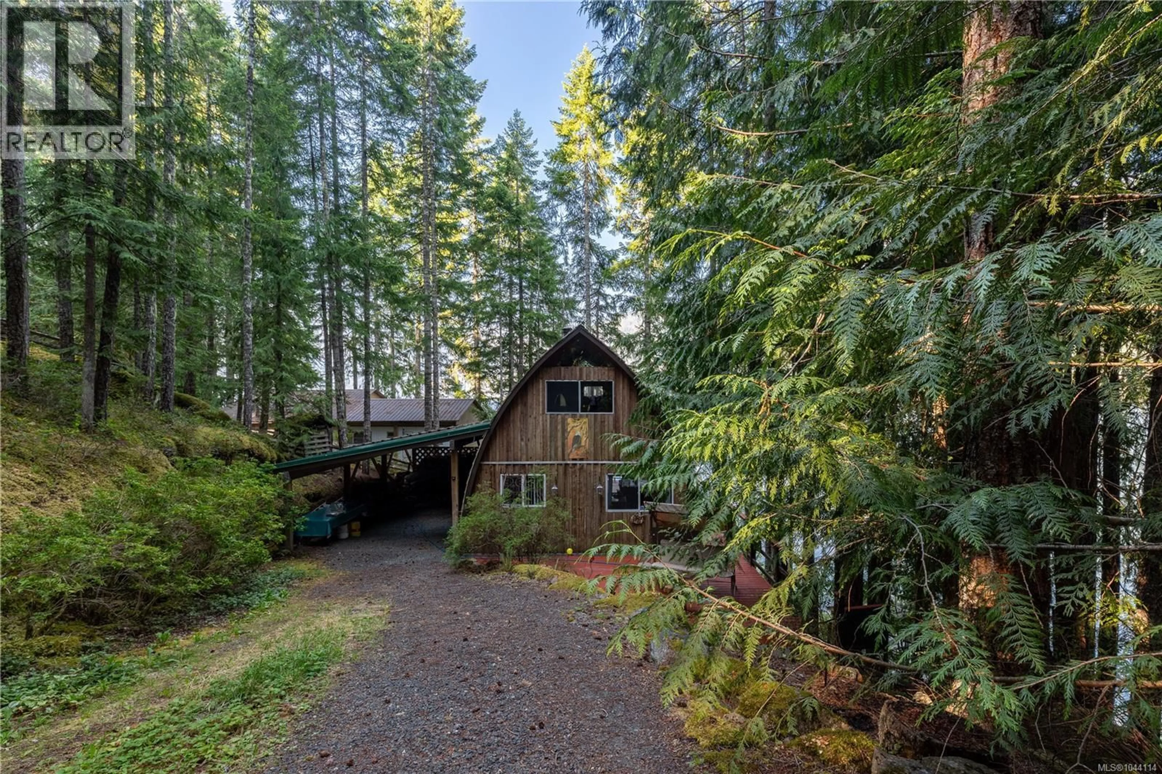 A pic from outside/outdoor area/front of a property/back of a property/a pic from drone, forest/trees view for 7 BAIKIE DRIVE, Campbell River British Columbia V9W2C5
