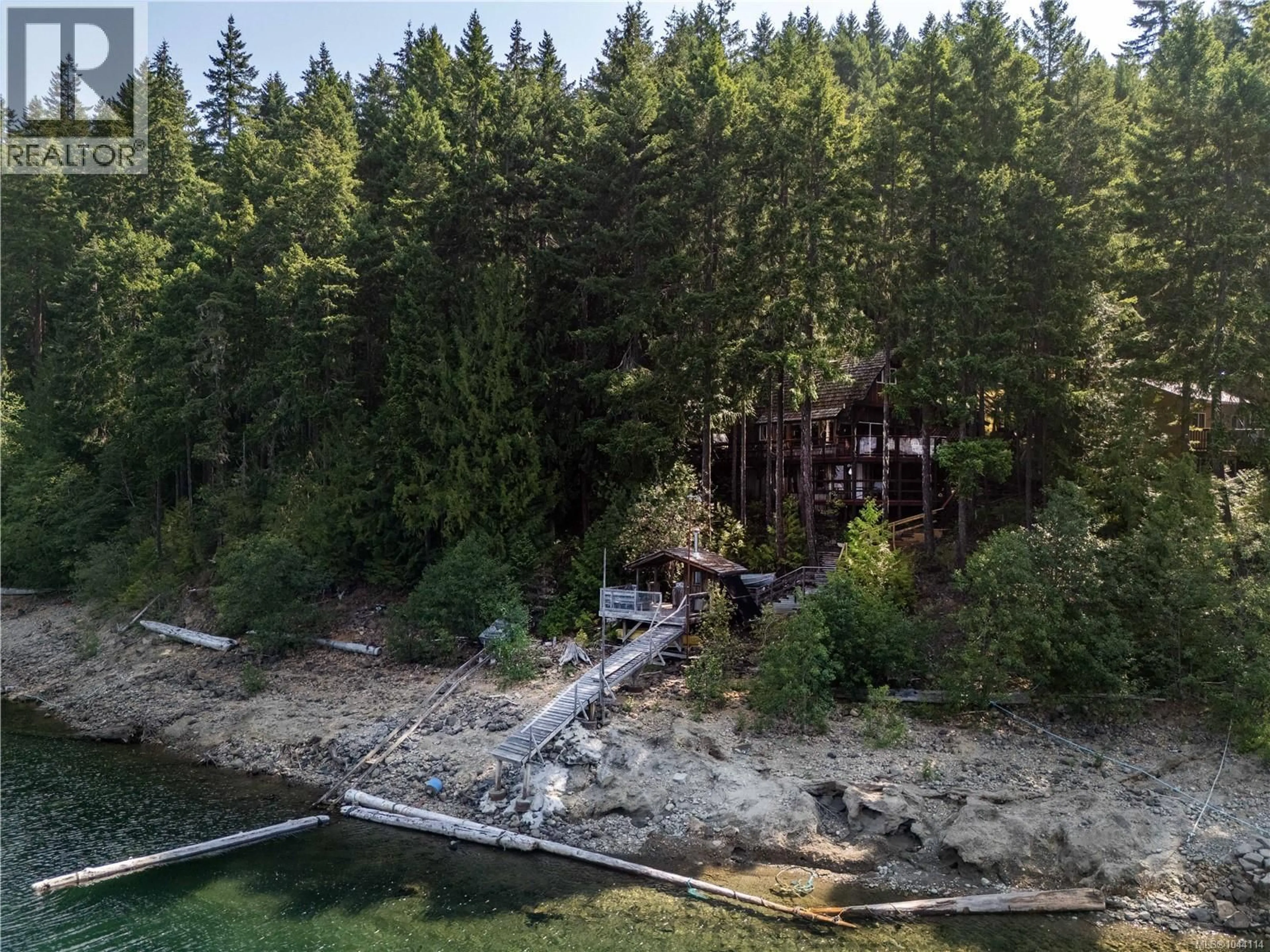 A pic from outside/outdoor area/front of a property/back of a property/a pic from drone, forest/trees view for 7 BAIKIE DRIVE, Campbell River British Columbia V9W2C5