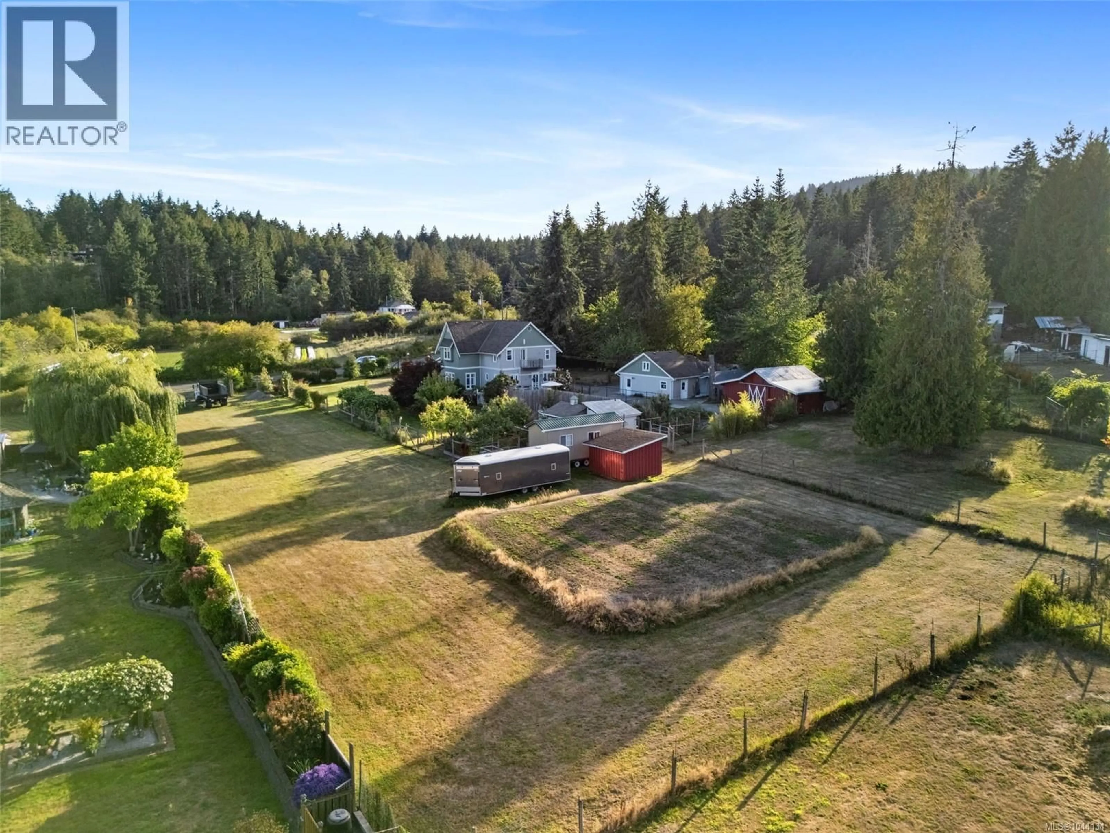 A pic from outside/outdoor area/front of a property/back of a property/a pic from drone, unknown for 1559 TATLO ROAD, Crofton British Columbia V0R1R0