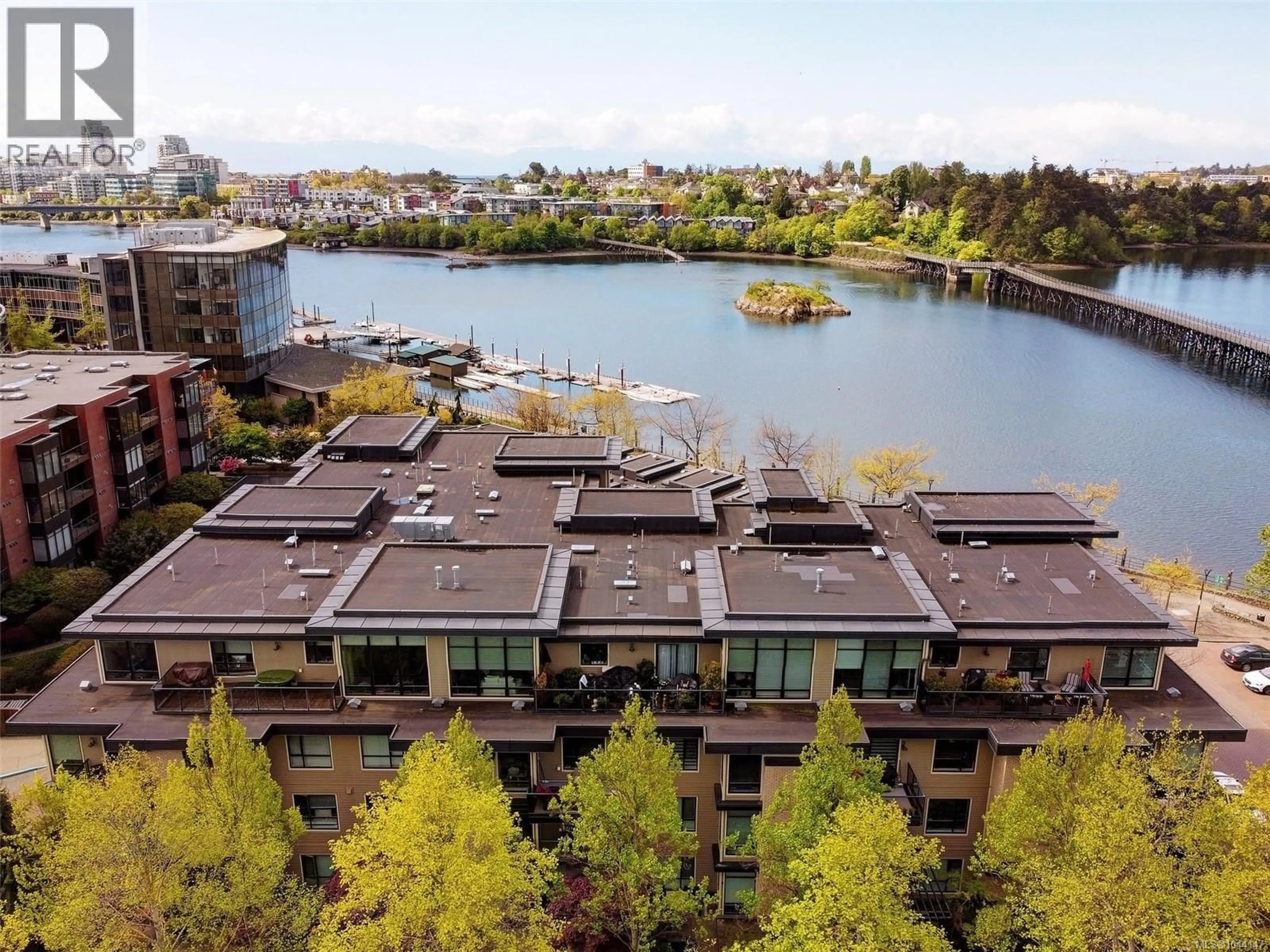 A pic from outside/outdoor area/front of a property/back of a property/a pic from drone, water/lake/river/ocean view for 206 - 330 WATERFRONT CRESCENT, Victoria British Columbia V8T5K3