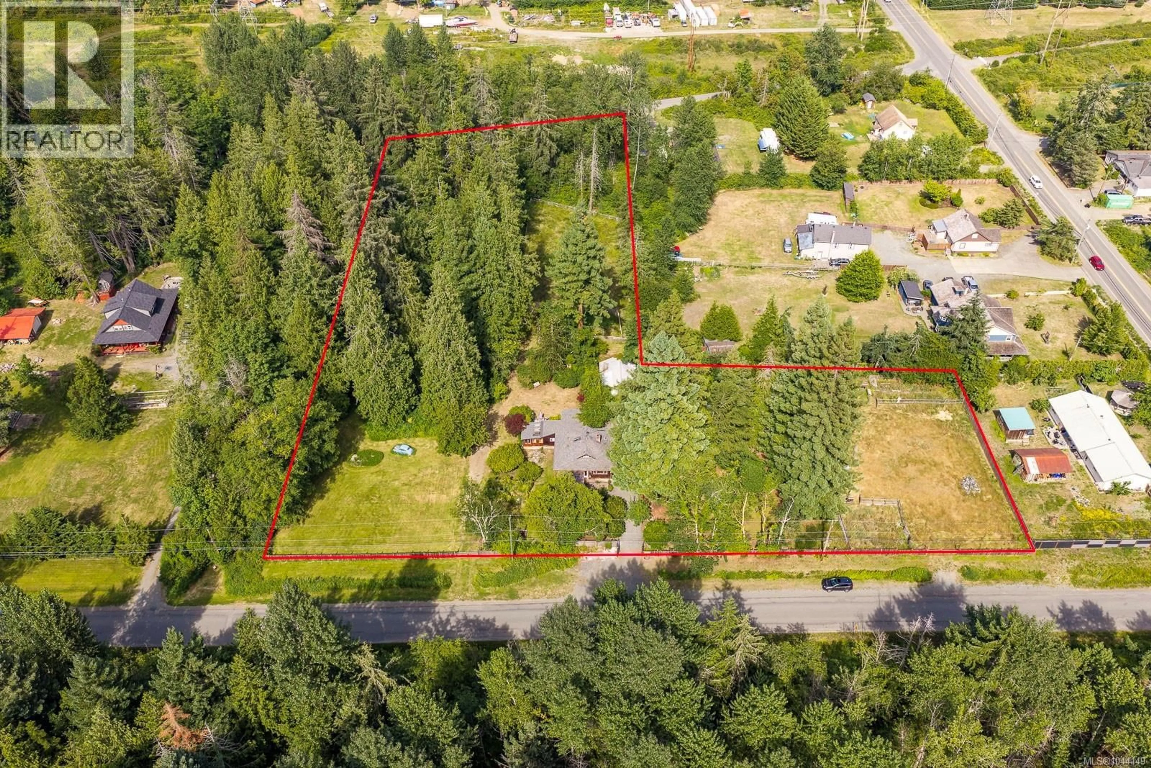 A pic from outside/outdoor area/front of a property/back of a property/a pic from drone, forest/trees view for 4374 MARSDEN ROAD, Courtenay British Columbia V9N9M5