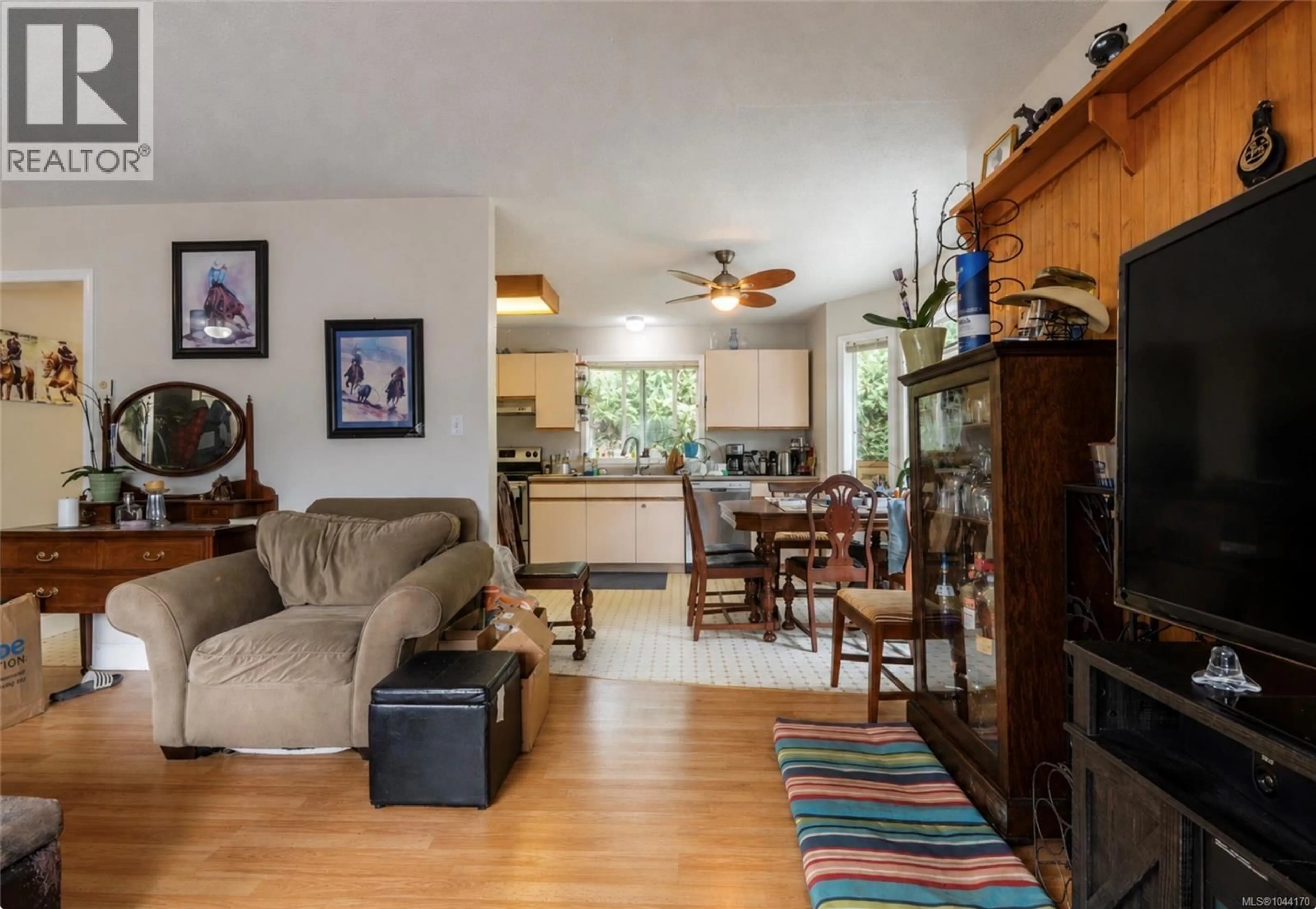 Living room with furniture, wood/laminate floor for 135 MACDONALD ROAD, Lake Cowichan British Columbia V0R2G0