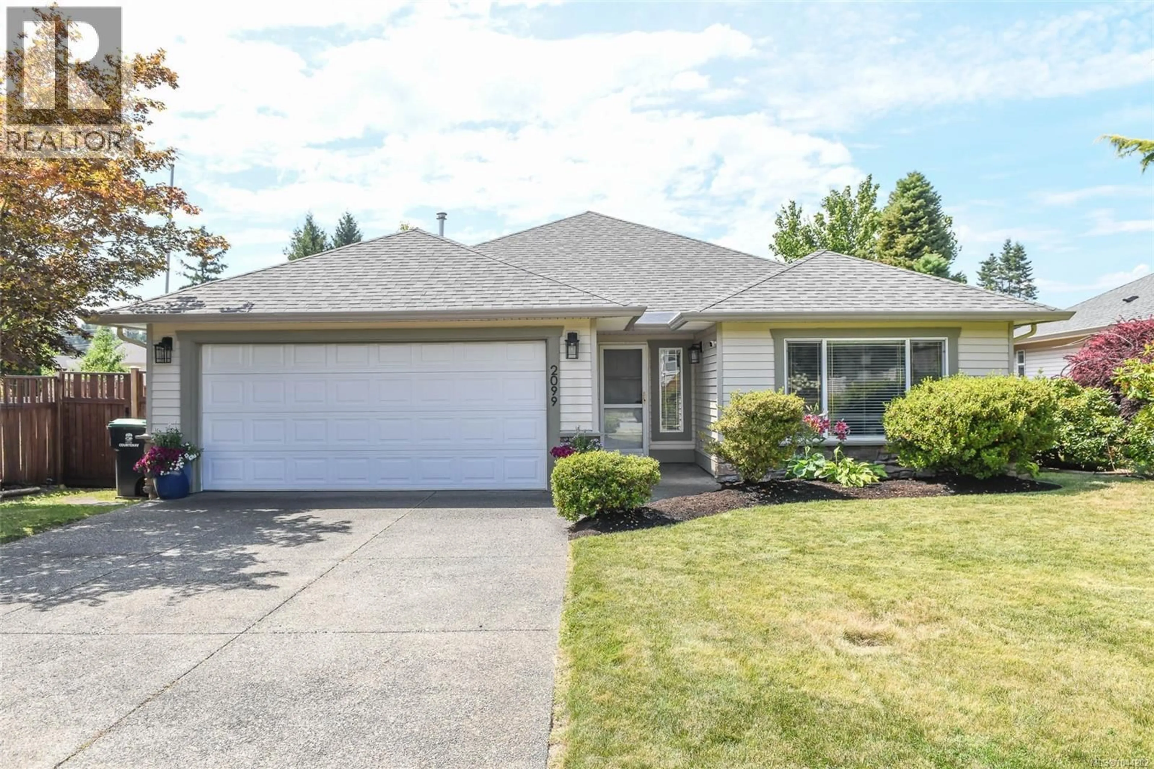 Home with vinyl exterior material, street for 2099 ST. ANDREWS WAY, Courtenay British Columbia V9N9V5