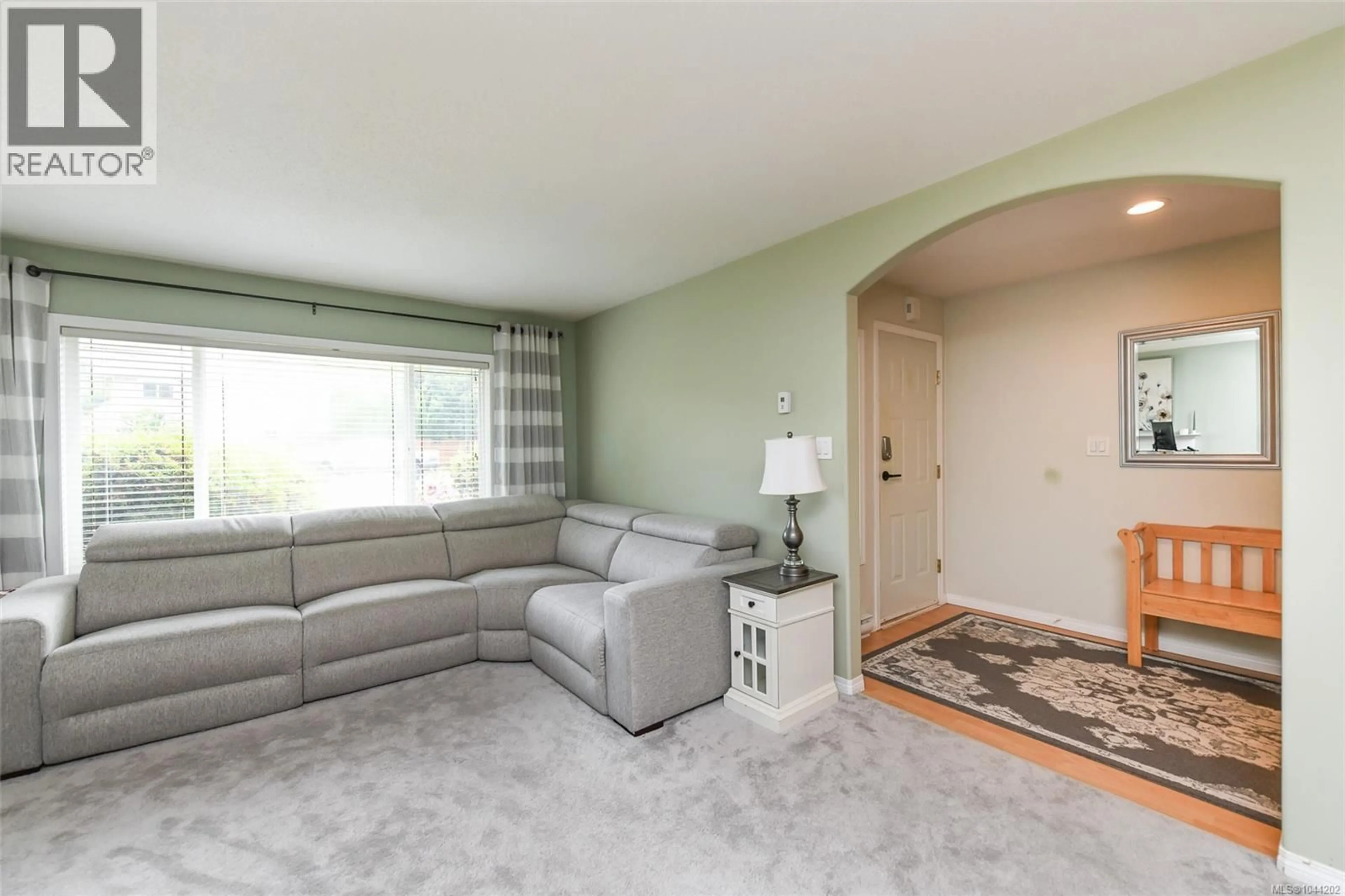 Living room with furniture, carpet floor for 2099 ST. ANDREWS WAY, Courtenay British Columbia V9N9V5