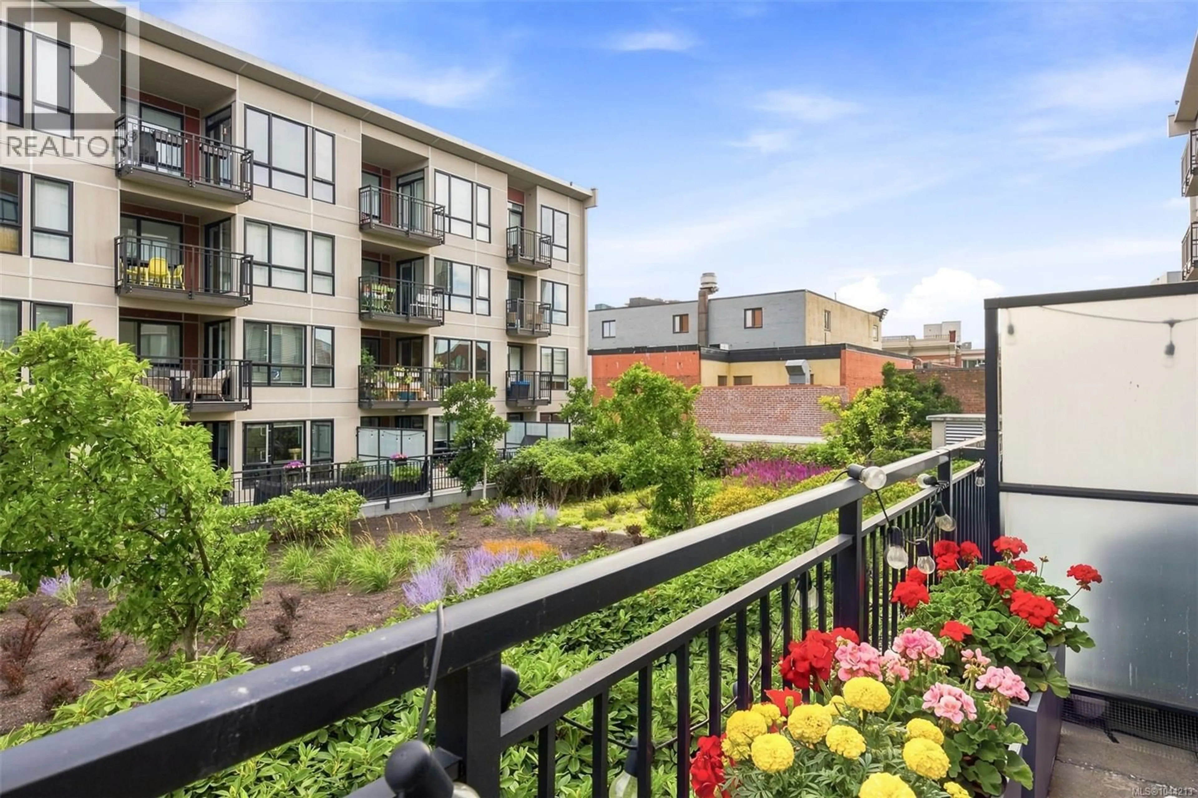 Patio, city buildings view from balcony for 215 - 517 FISGARD STREET, Victoria British Columbia V8W0C5