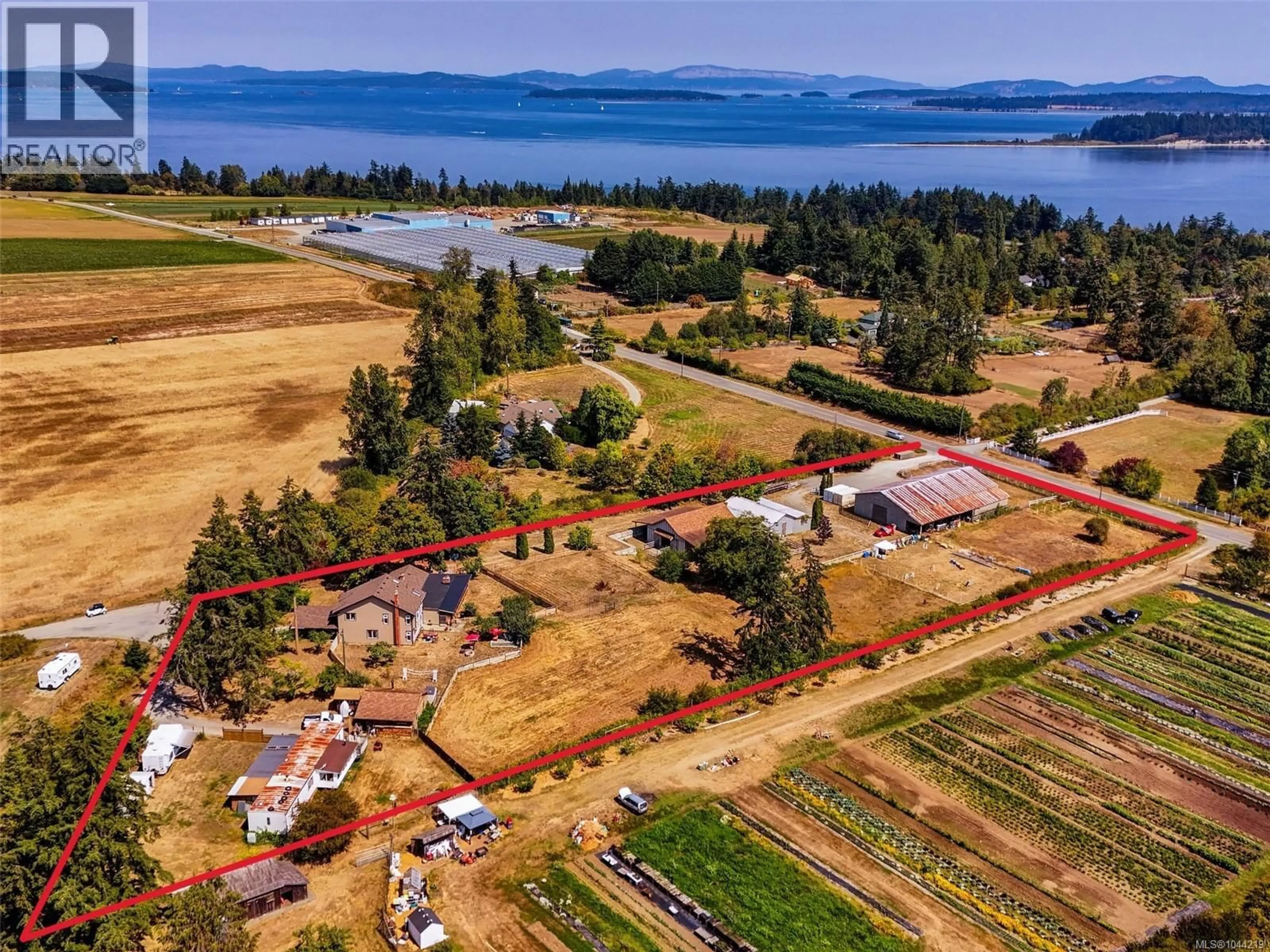 A pic from outside/outdoor area/front of a property/back of a property/a pic from drone, water/lake/river/ocean view for 2269 NEWMAN ROAD, Central Saanich British Columbia V8M1T3