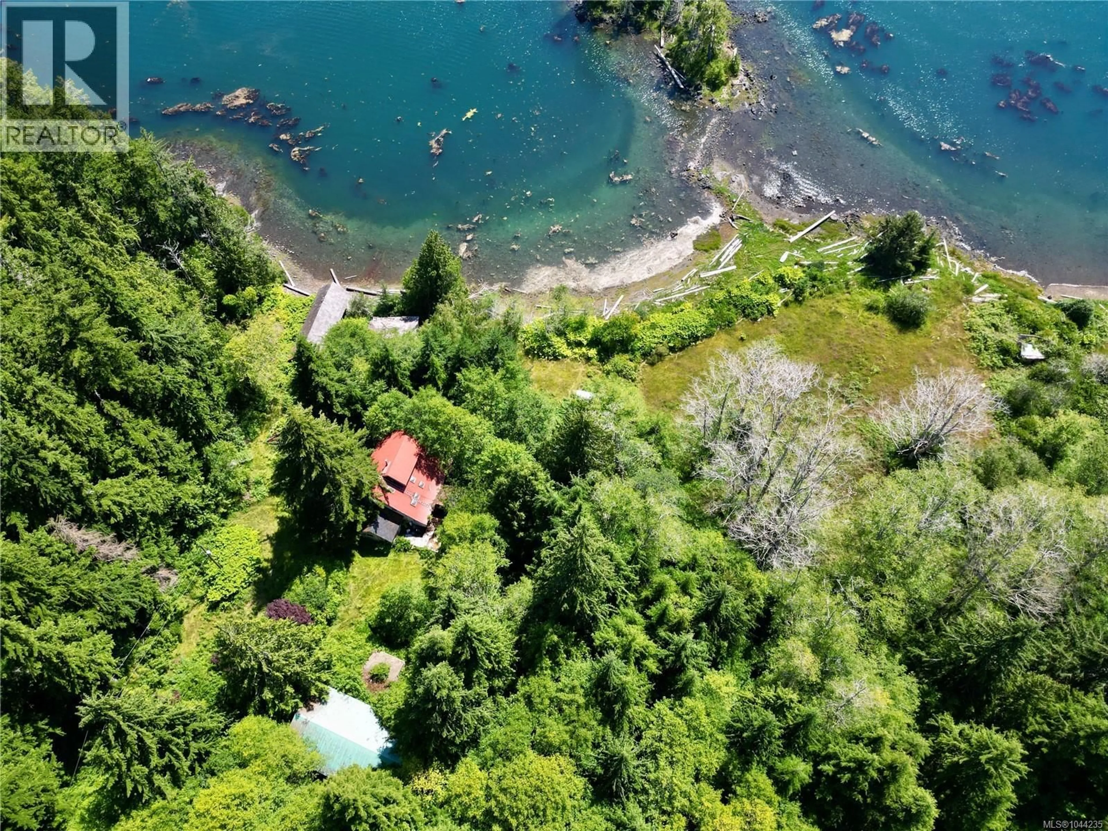 A pic from outside/outdoor area/front of a property/back of a property/a pic from drone, water/lake/river/ocean view for 245 QUATSINO ROAD, Quatsino British Columbia V0N2V0