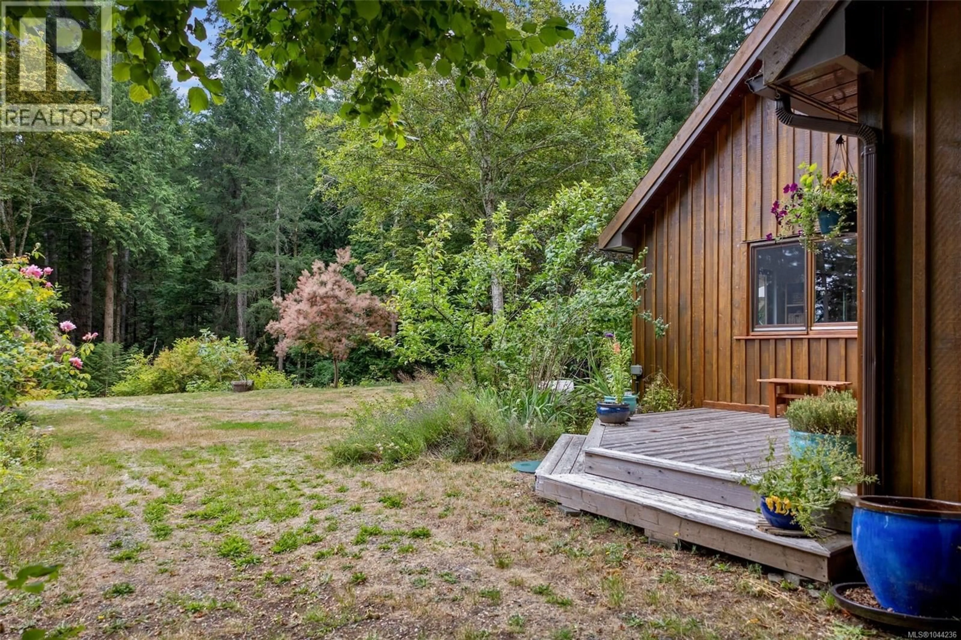 Patio, forest/trees view for 1551 PICKLES ROAD, Denman Island British Columbia V0R1T0