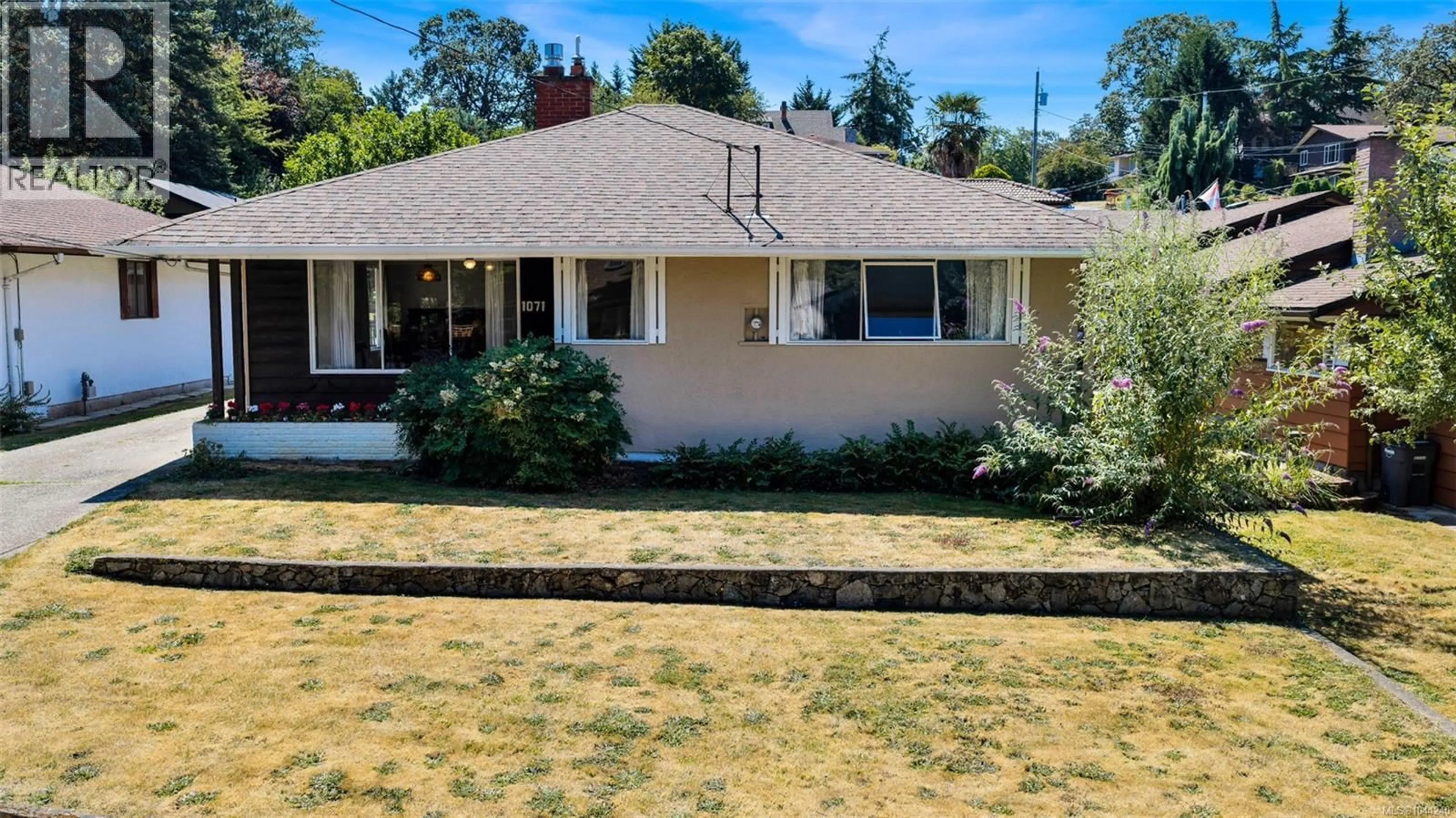 A pic from outside/outdoor area/front of a property/back of a property/a pic from drone, street for 1071 LODGE AVENUE, Saanich British Columbia V8X3B2
