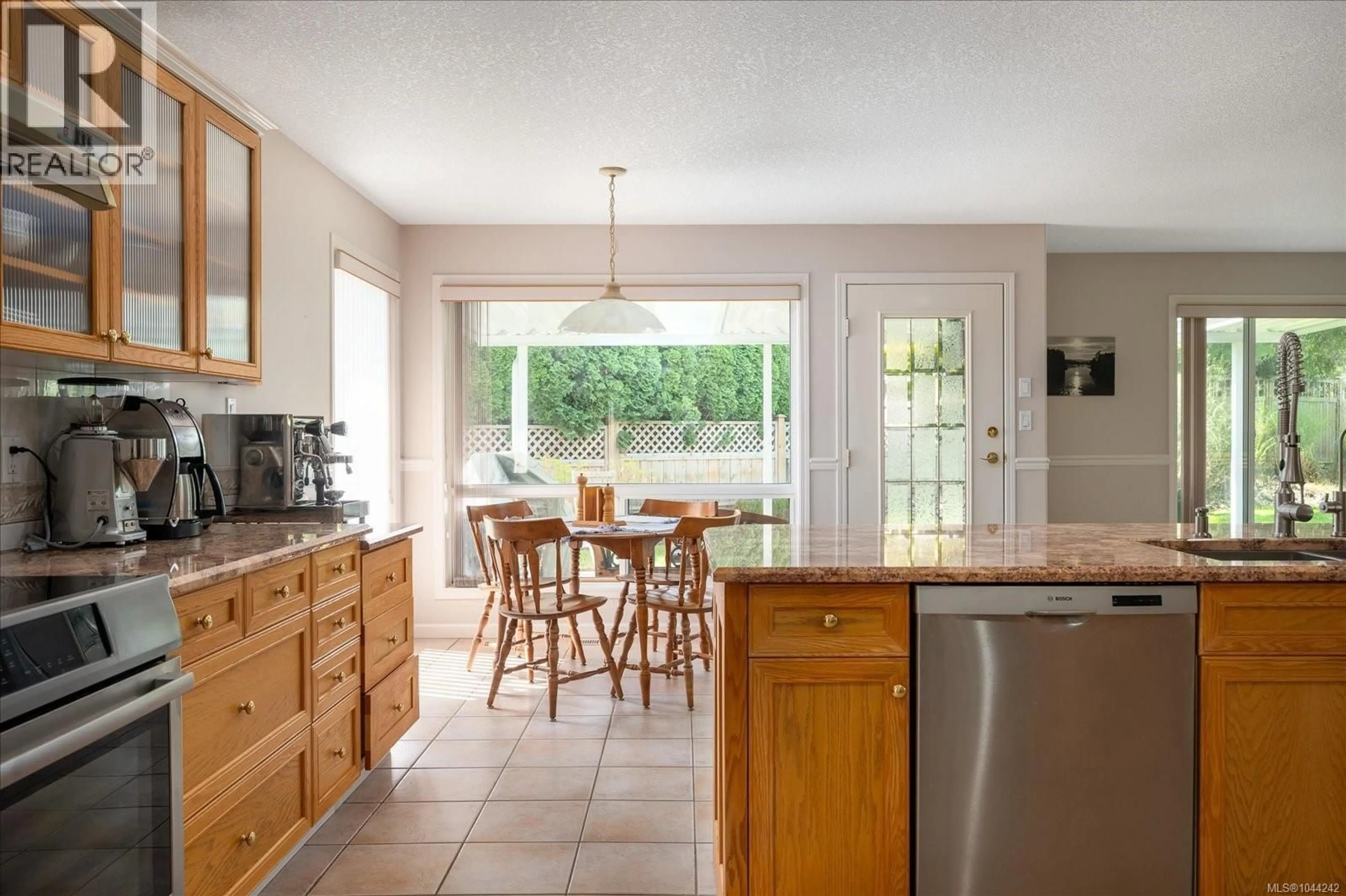 Open concept kitchen, ceramic/tile floor for 828 DEVON PLACE, Qualicum Beach British Columbia V9K2P2