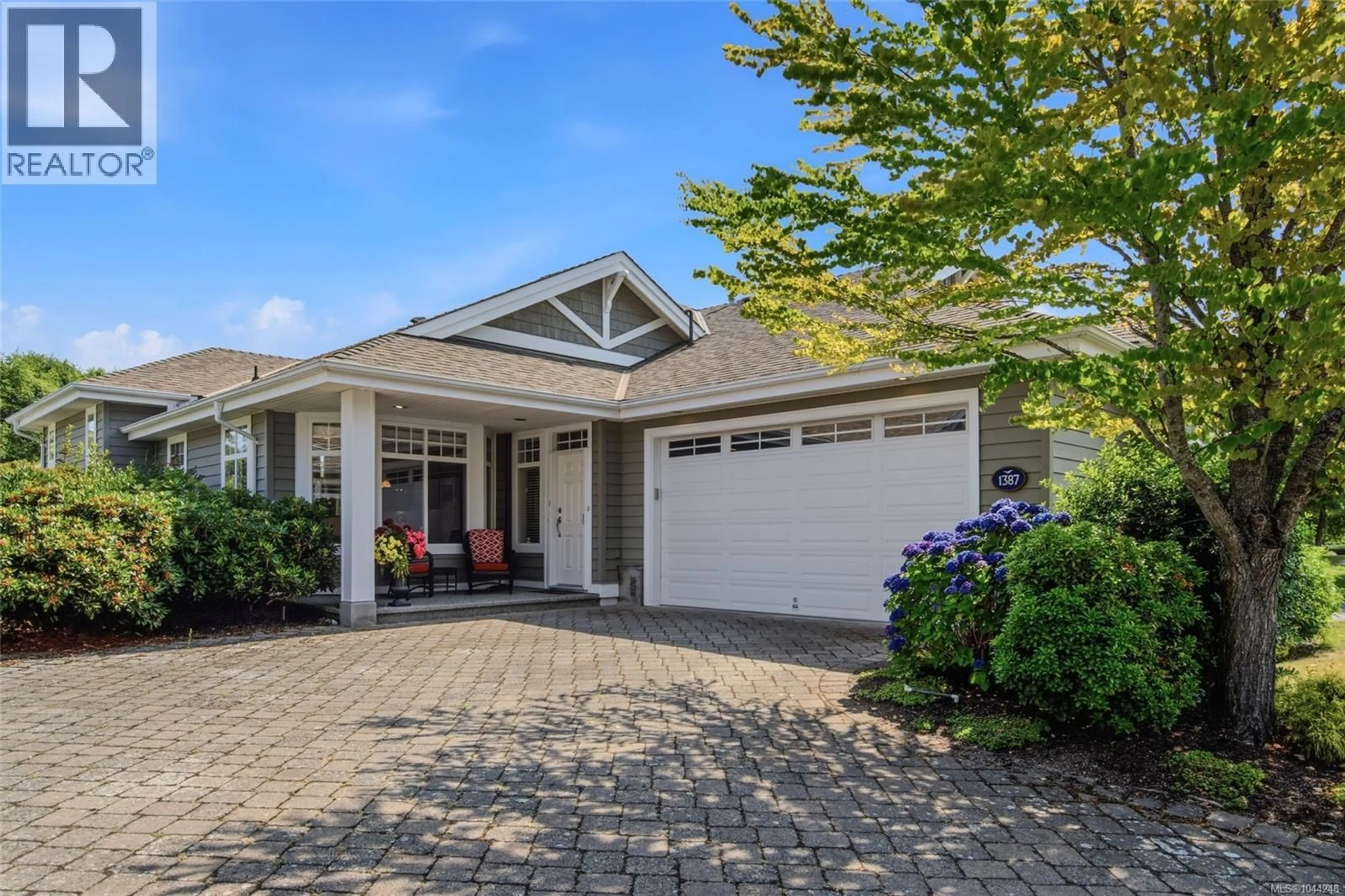 Home with vinyl exterior material, street for 1387 SATURNA DRIVE, Parksville British Columbia V9P2Y1