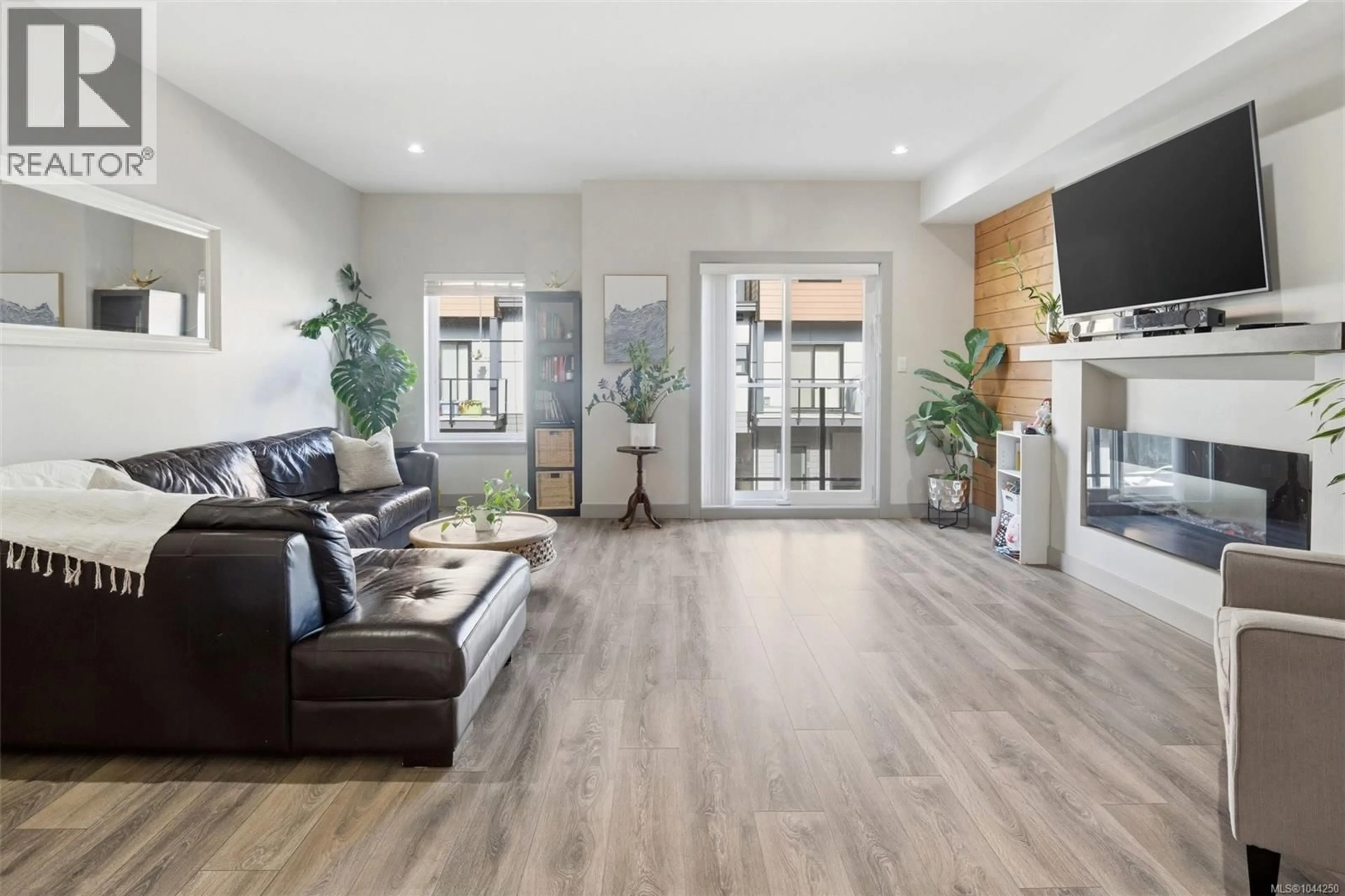 Living room with furniture, unknown for 103 - 687 STRANDLUND AVENUE, Langford British Columbia V9B3G2