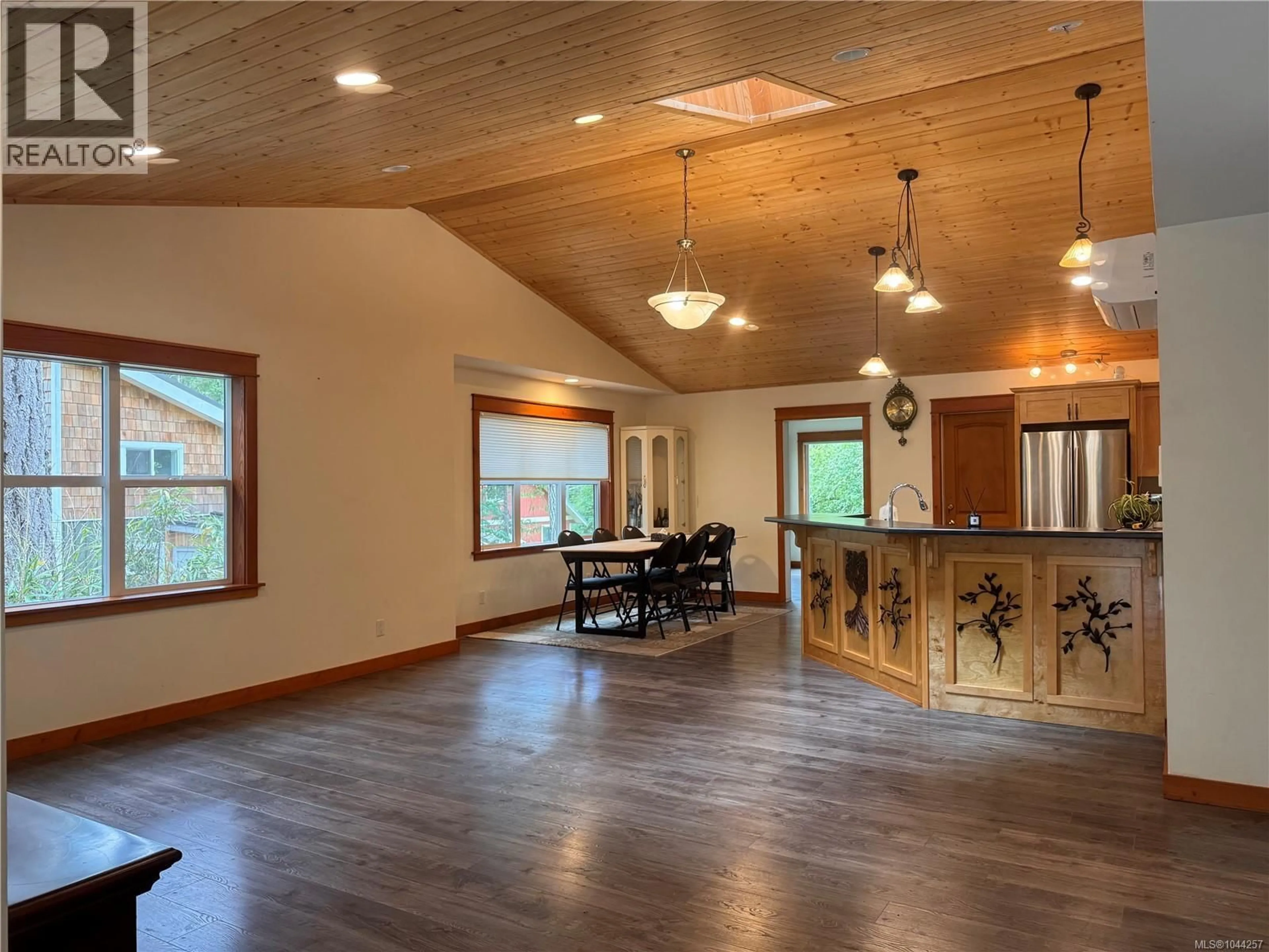 Open concept kitchen, wood/laminate floor for 685 ROLLO ROAD, Gabriola Island British Columbia V0R1X3
