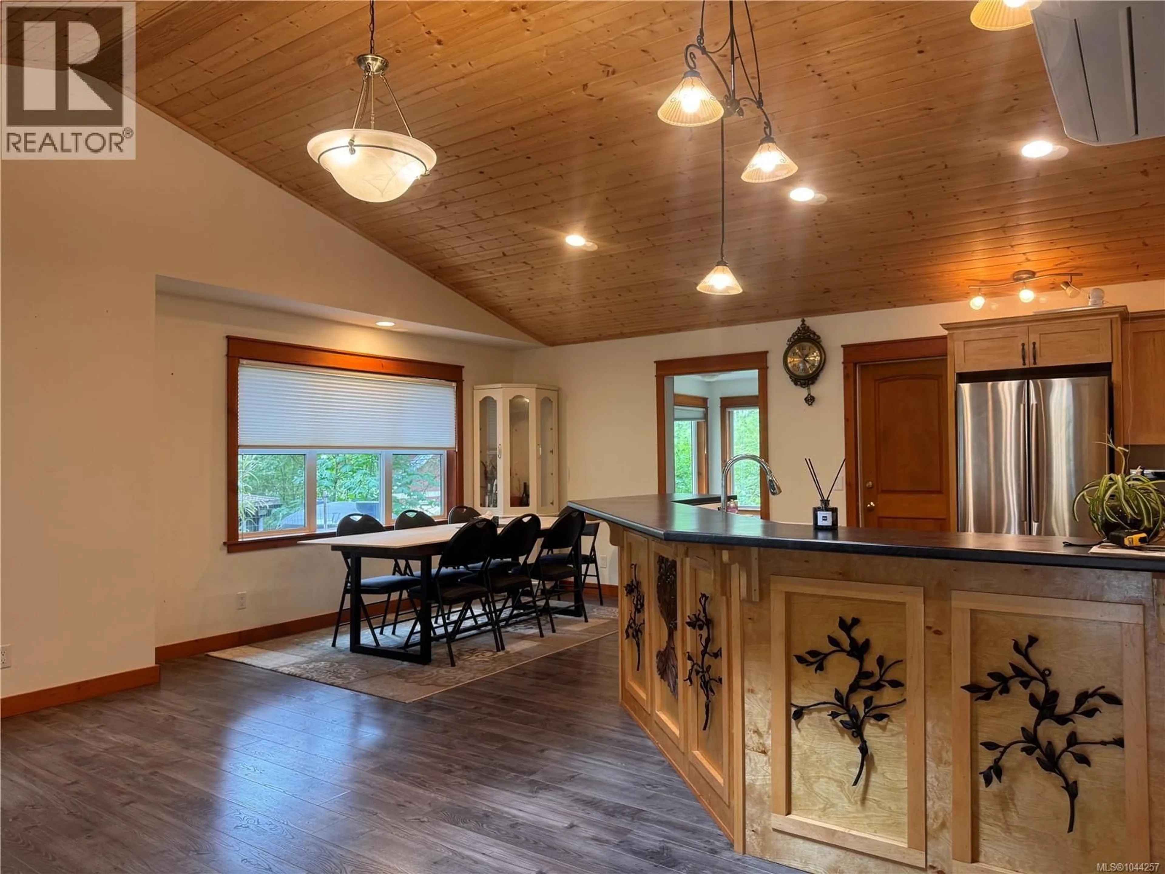 Open concept kitchen, wood/laminate floor for 685 ROLLO ROAD, Gabriola Island British Columbia V0R1X3