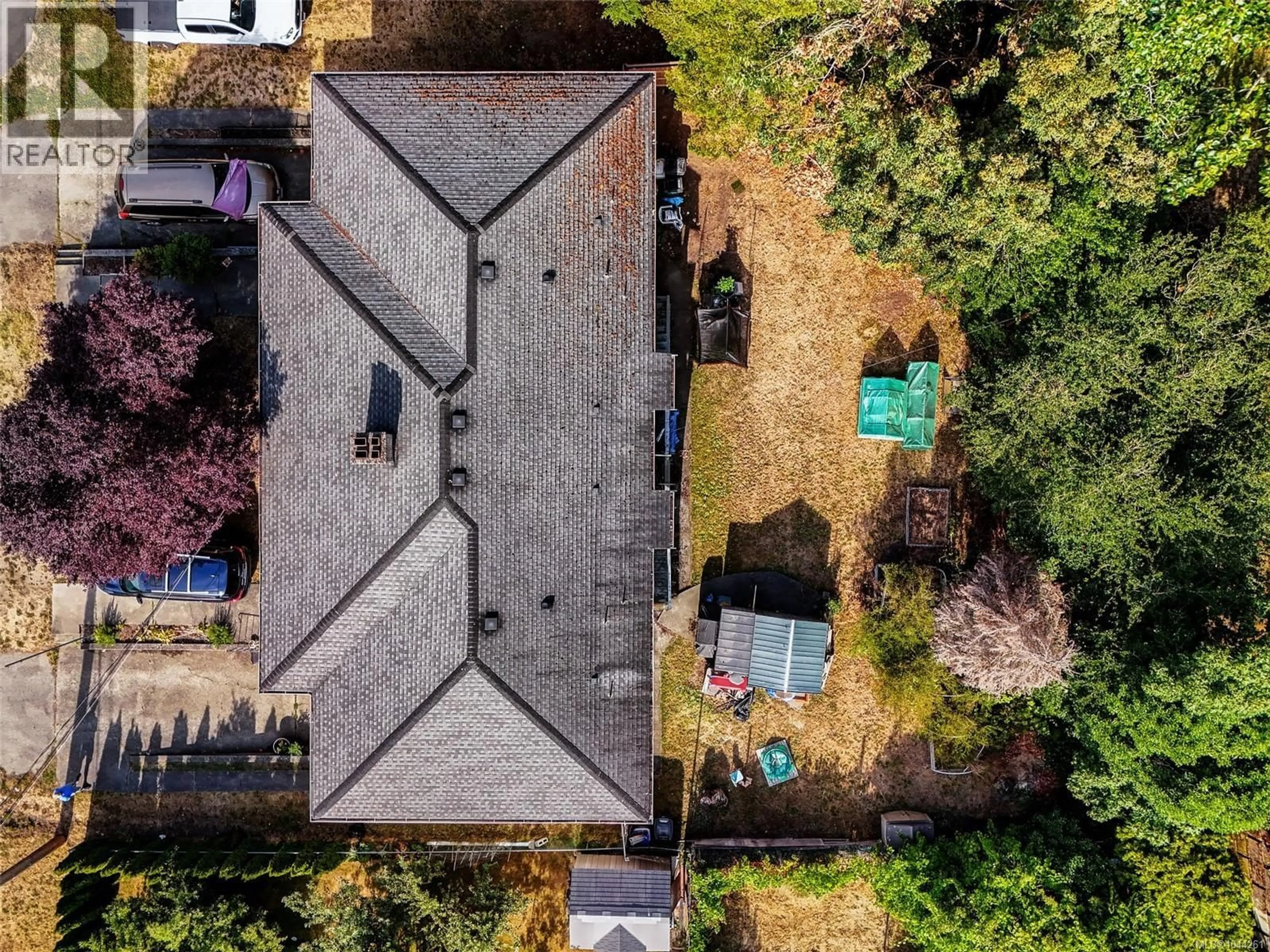 A pic from outside/outdoor area/front of a property/back of a property/a pic from drone, street for 1564 NORTH DAIRY ROAD, Saanich British Columbia V8T3V3