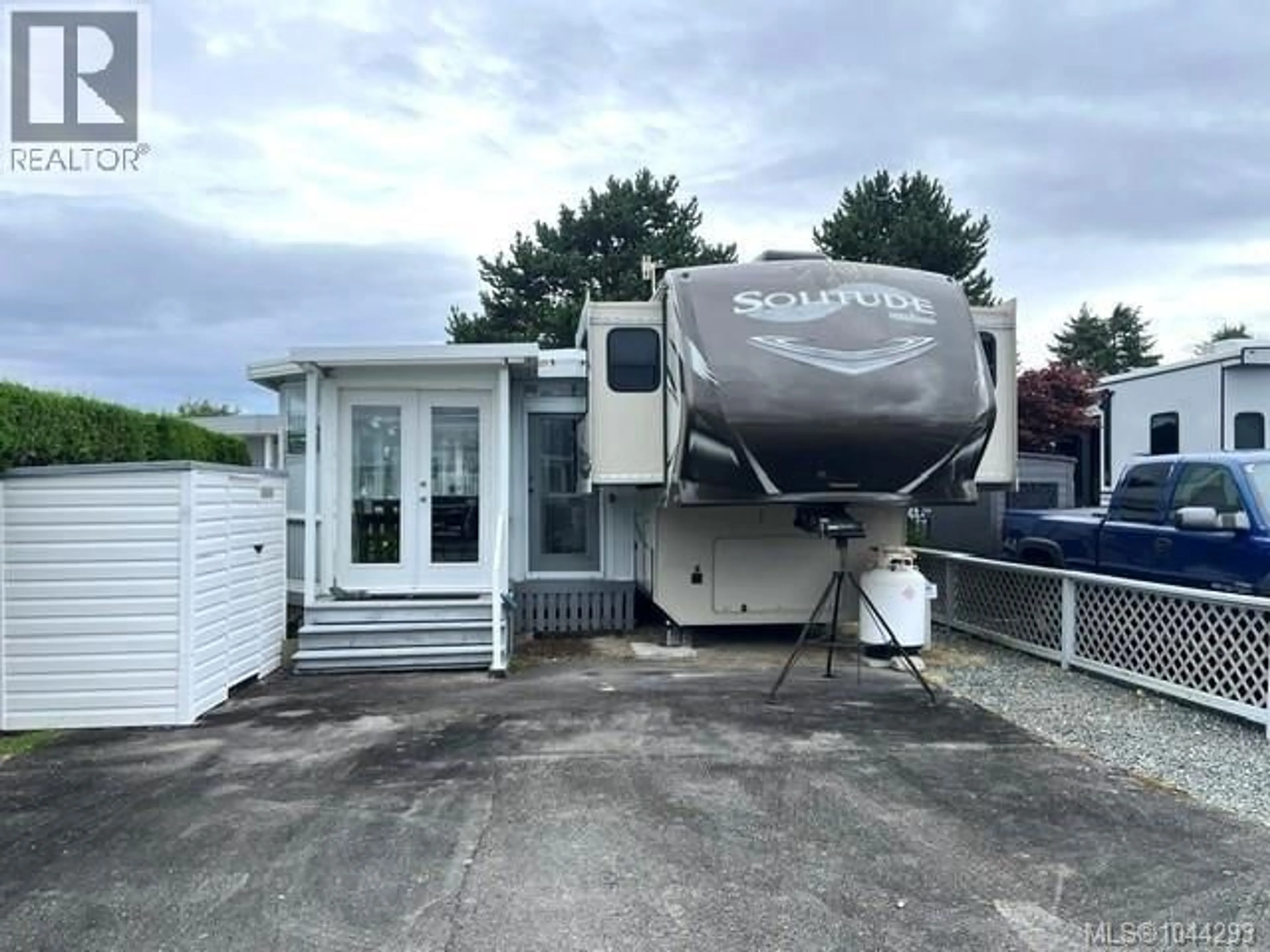 A pic from outside/outdoor area/front of a property/back of a property/a pic from drone, street for 305 - 200 CORFIELD STREET, Parksville British Columbia V9P2H5