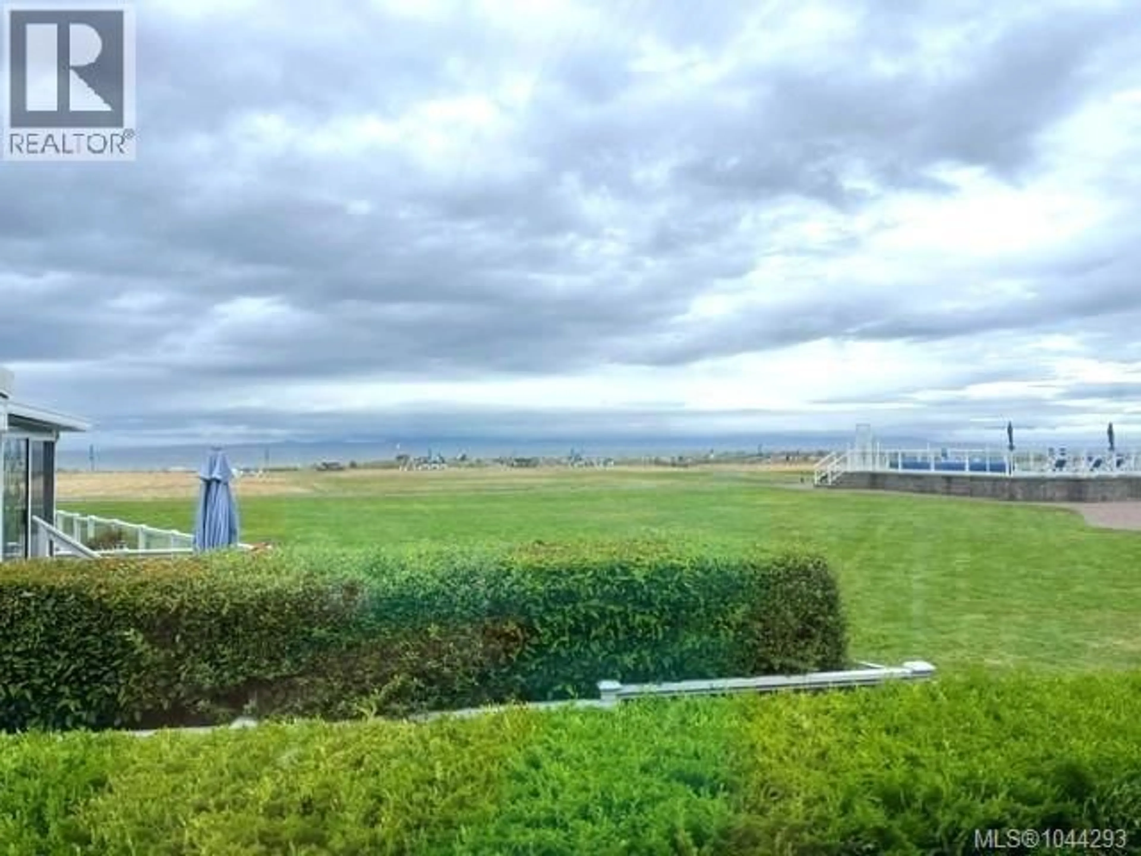 A pic from outside/outdoor area/front of a property/back of a property/a pic from drone, unknown for 305 - 200 CORFIELD STREET, Parksville British Columbia V9P2H5
