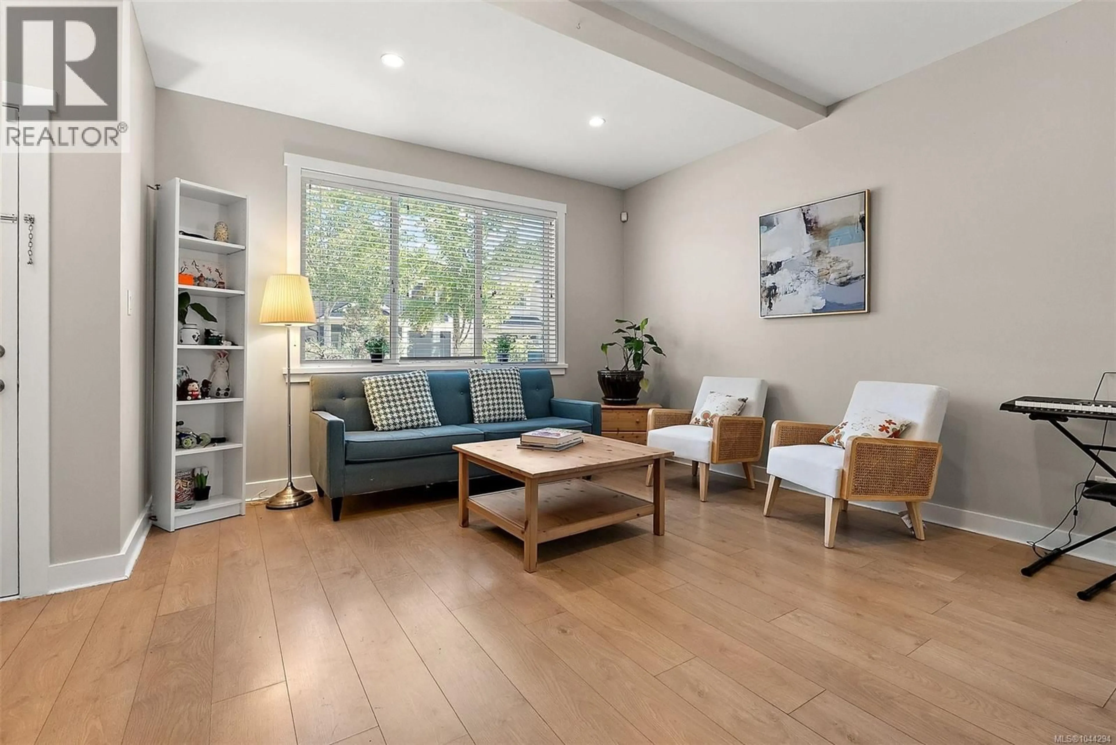Living room with furniture, wood/laminate floor for 1222 MCLEOD PLACE, Langford British Columbia V9C0K6
