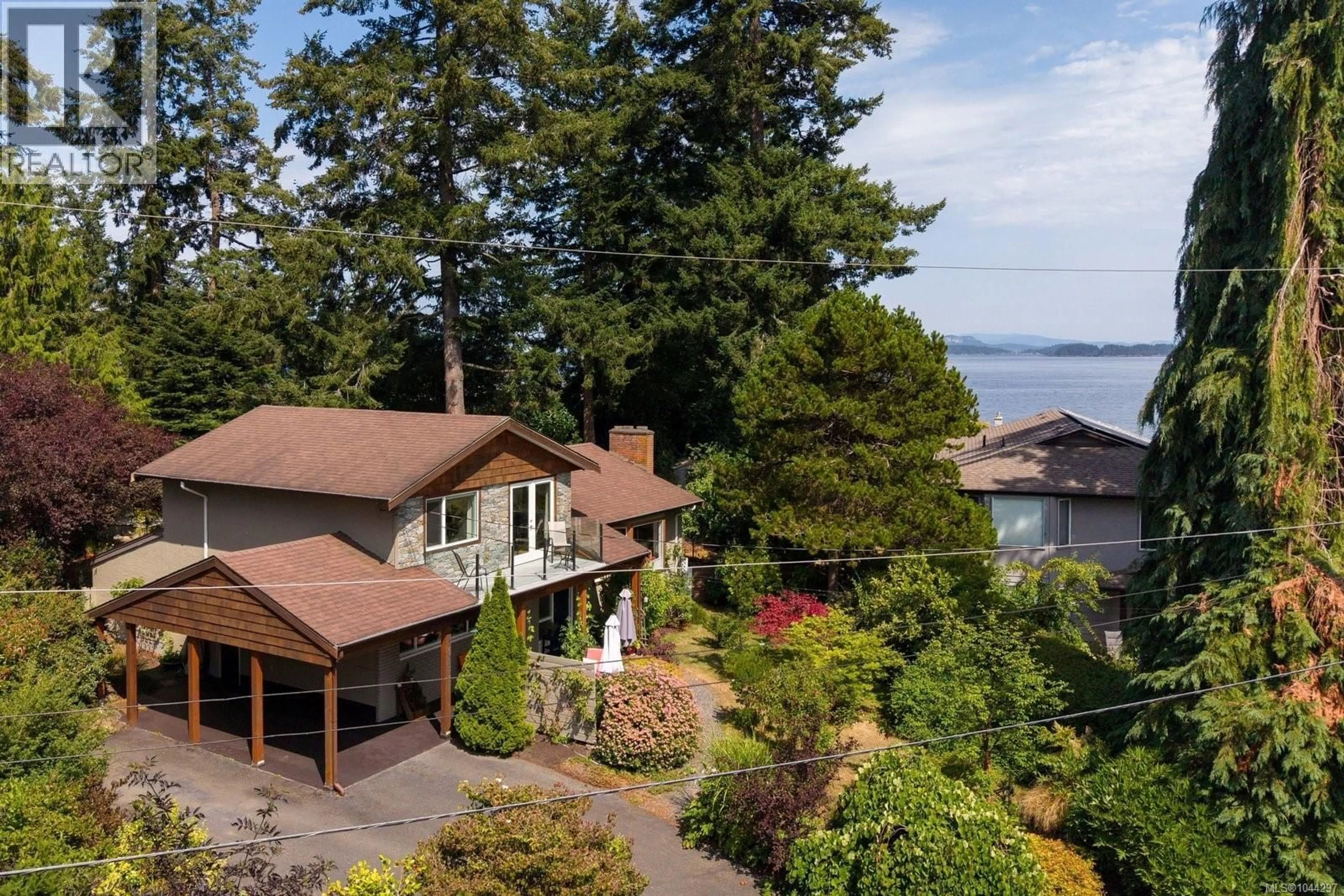 A pic from outside/outdoor area/front of a property/back of a property/a pic from drone, water/lake/river/ocean view for 10496 JOCELYN PLACE, Sidney British Columbia V8L2P5