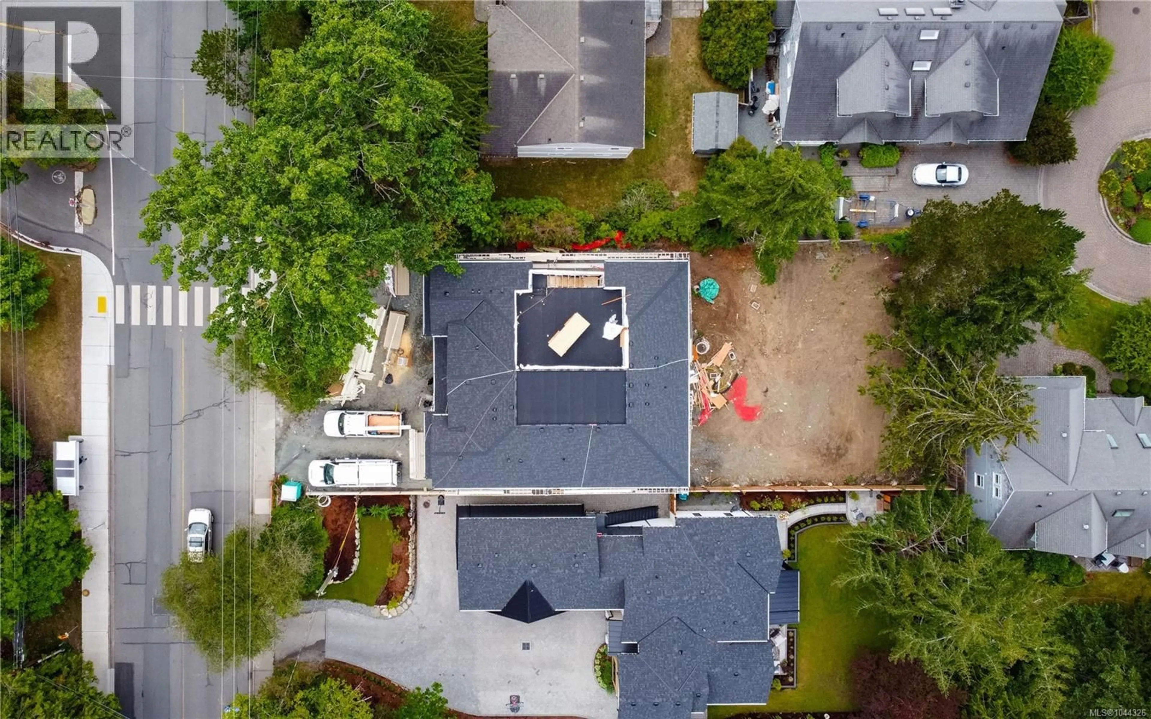 A pic from outside/outdoor area/front of a property/back of a property/a pic from drone, street for A - 3942 TELEGRAPH BAY ROAD, Saanich British Columbia V8N4H7