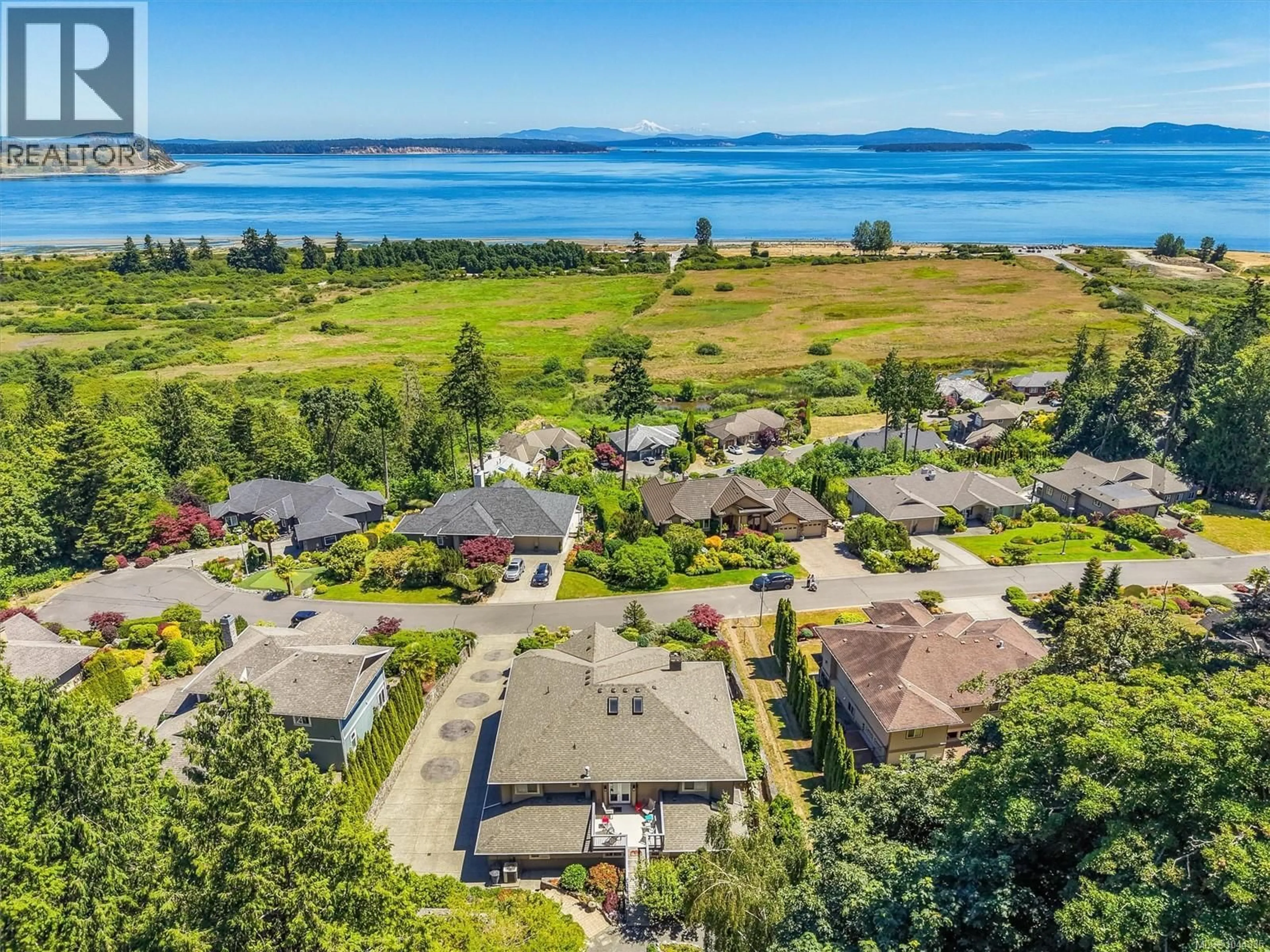 A pic from outside/outdoor area/front of a property/back of a property/a pic from drone, water/lake/river/ocean view for 7012 ISLAND VIEW PLACE, Central Saanich British Columbia V8M2J6