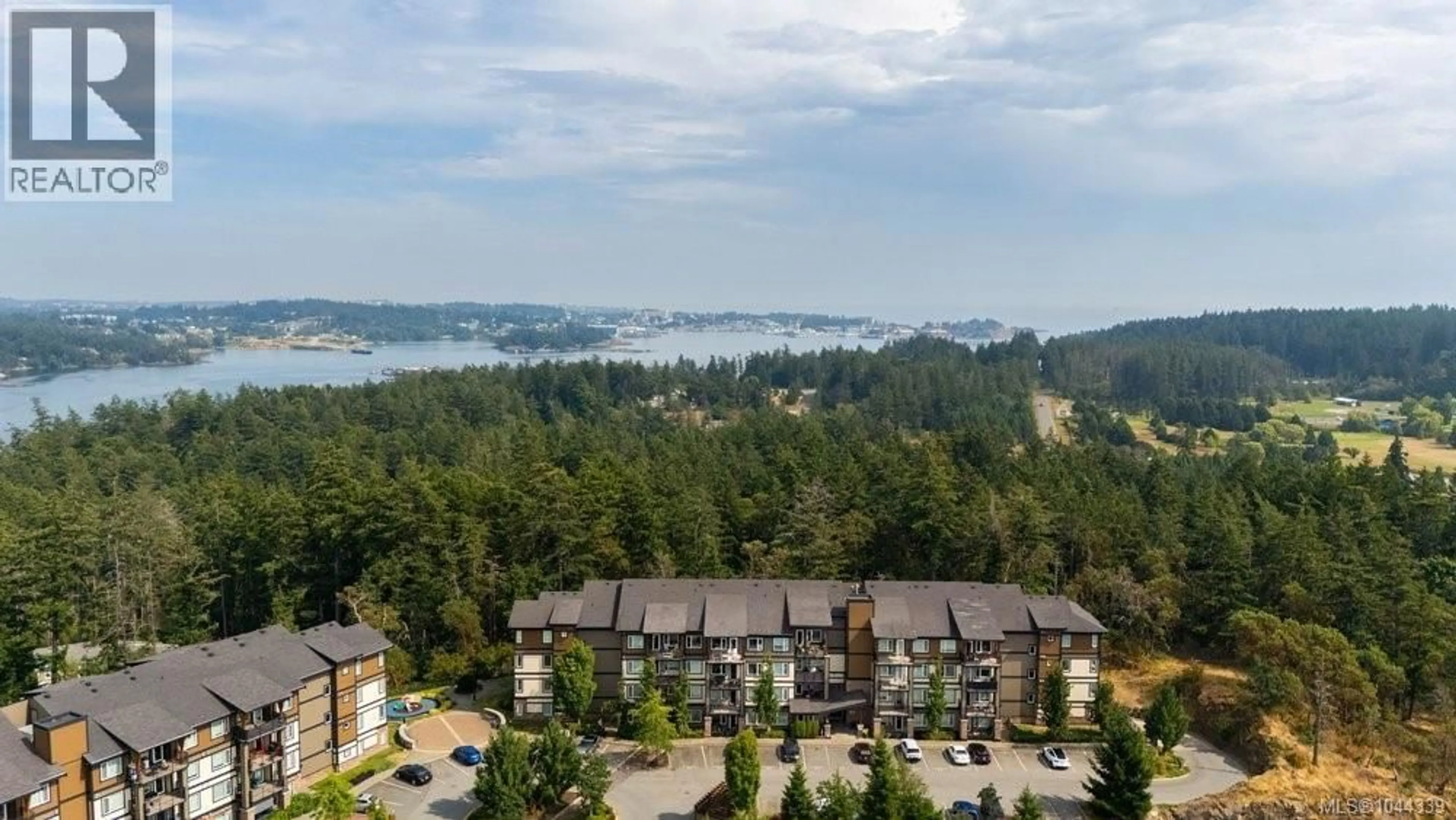 A pic from outside/outdoor area/front of a property/back of a property/a pic from drone, mountain view for 307 - 286 WILFERT ROAD, View Royal British Columbia V9C1A3