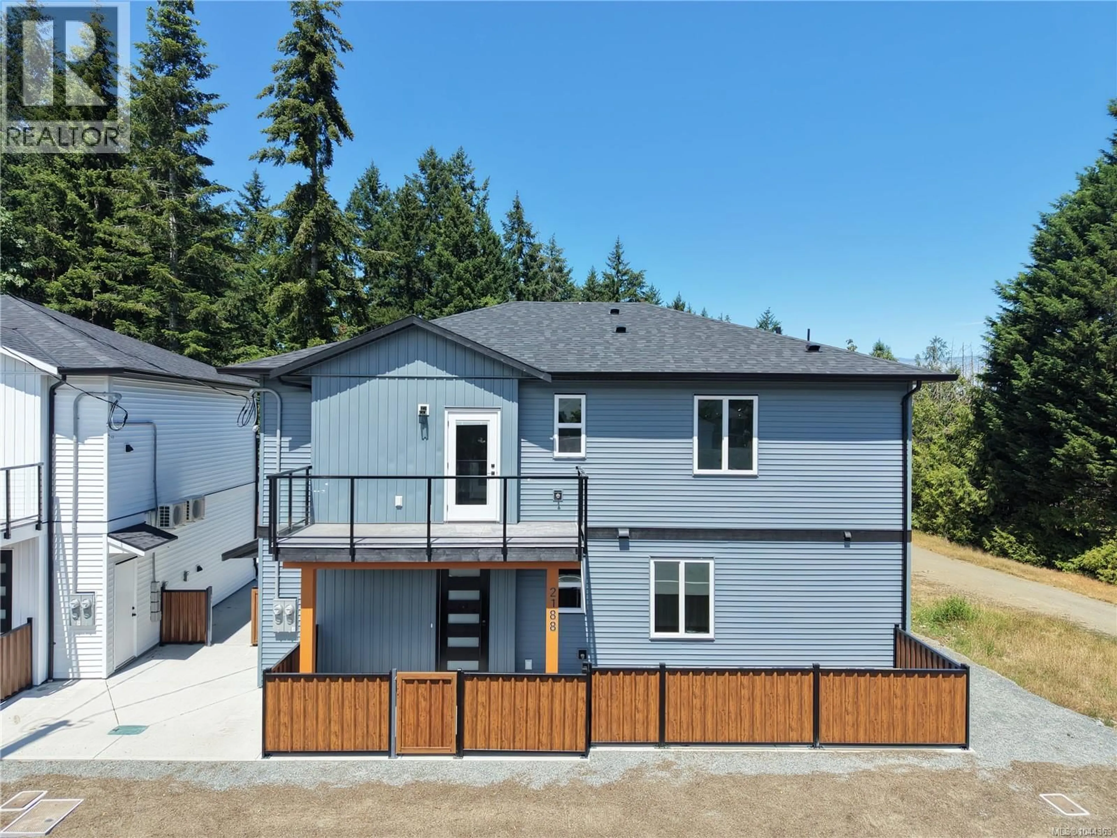 A pic from outside/outdoor area/front of a property/back of a property/a pic from drone, street for 200 - 2188 JINGLE POT ROAD, Nanaimo British Columbia V9R6J2