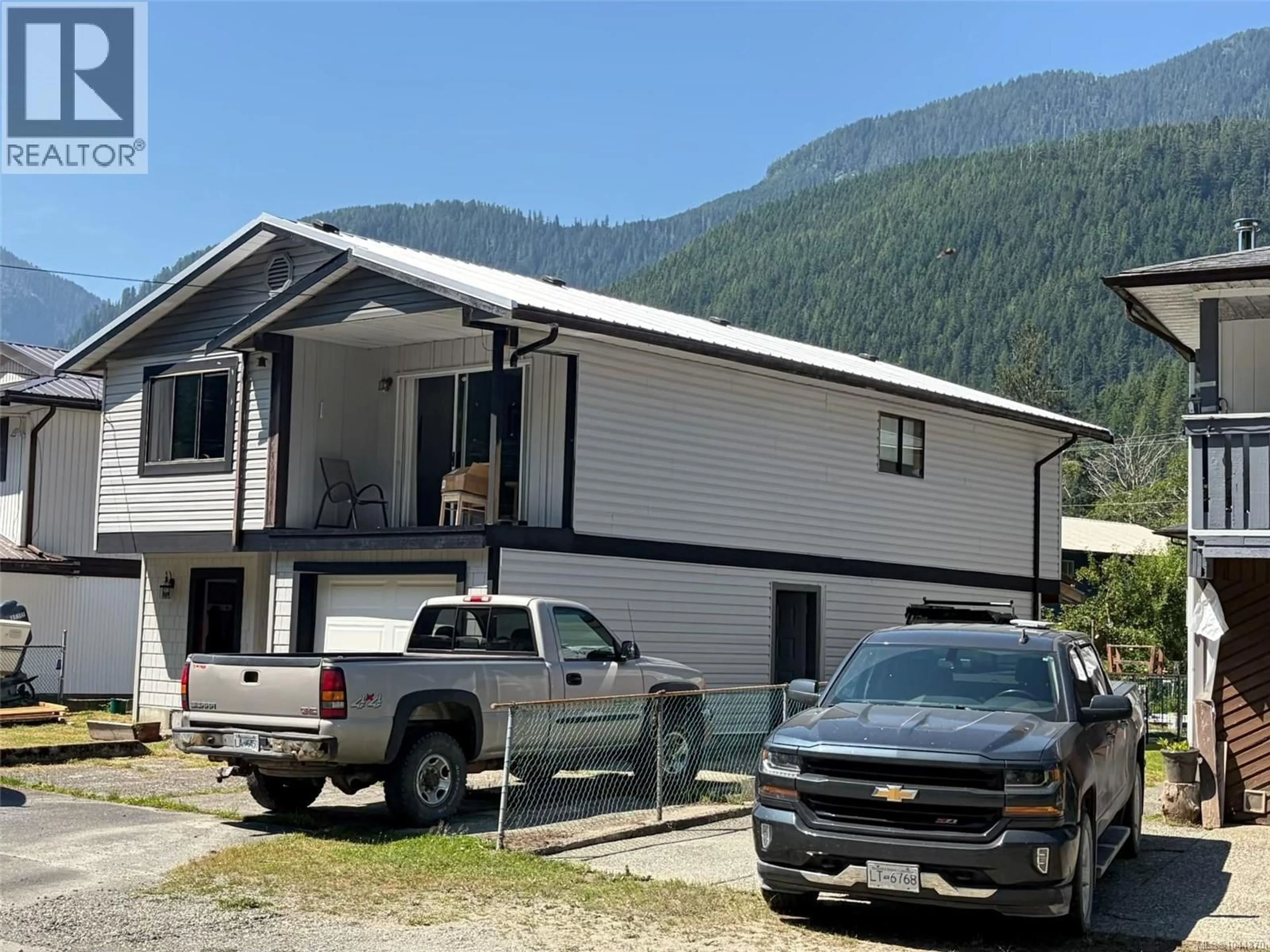 Home with vinyl exterior material, mountain view for 522 ALPINE VIEW ROAD, Tahsis British Columbia V0P1X0