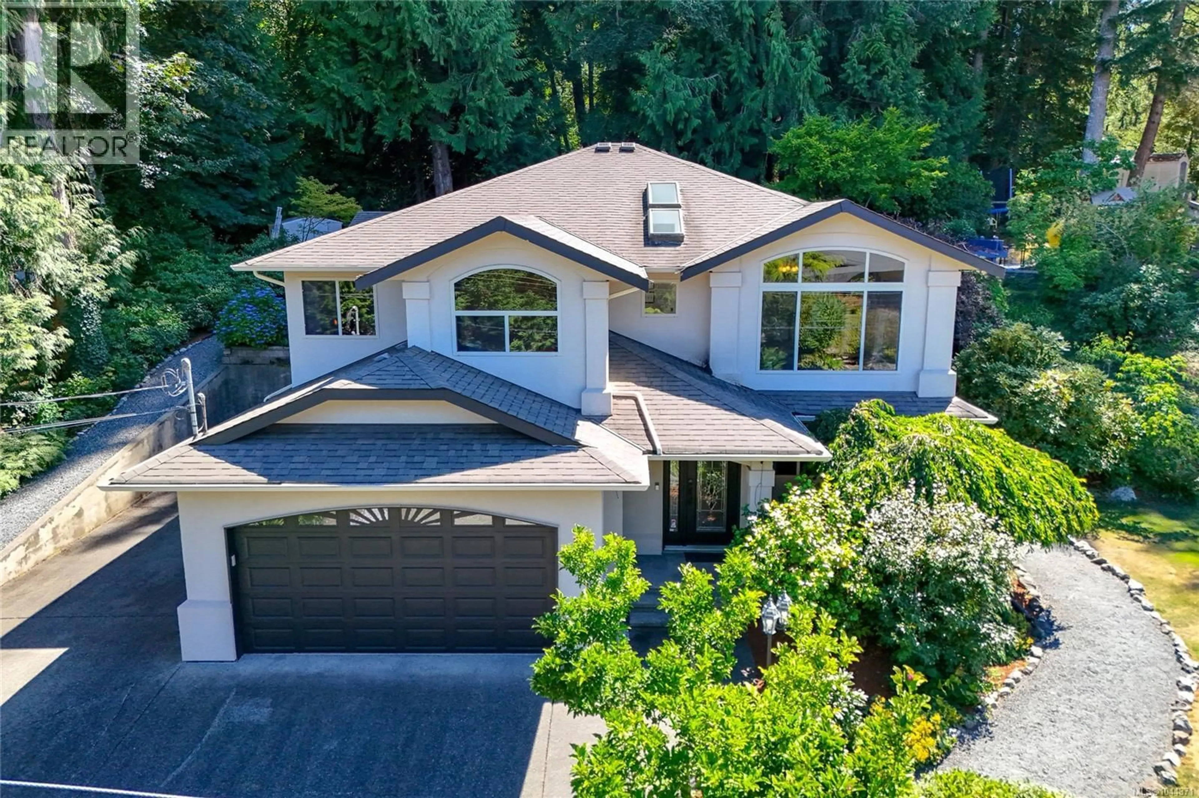 A pic from outside/outdoor area/front of a property/back of a property/a pic from drone, street for 804 BUCKTAIL ROAD, Mill Bay British Columbia V8H1H5