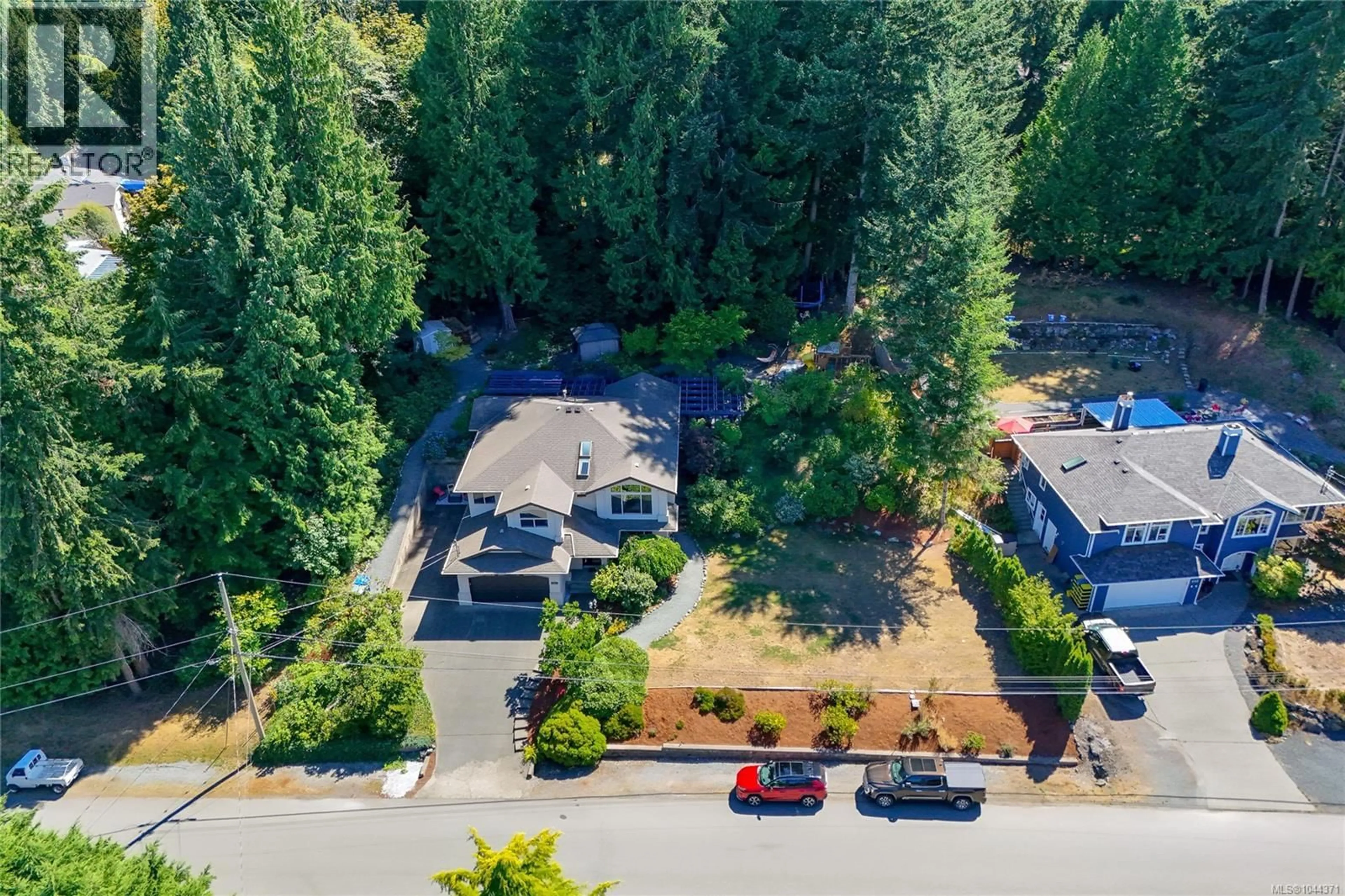 A pic from outside/outdoor area/front of a property/back of a property/a pic from drone, forest/trees view for 804 BUCKTAIL ROAD, Mill Bay British Columbia V8H1H5
