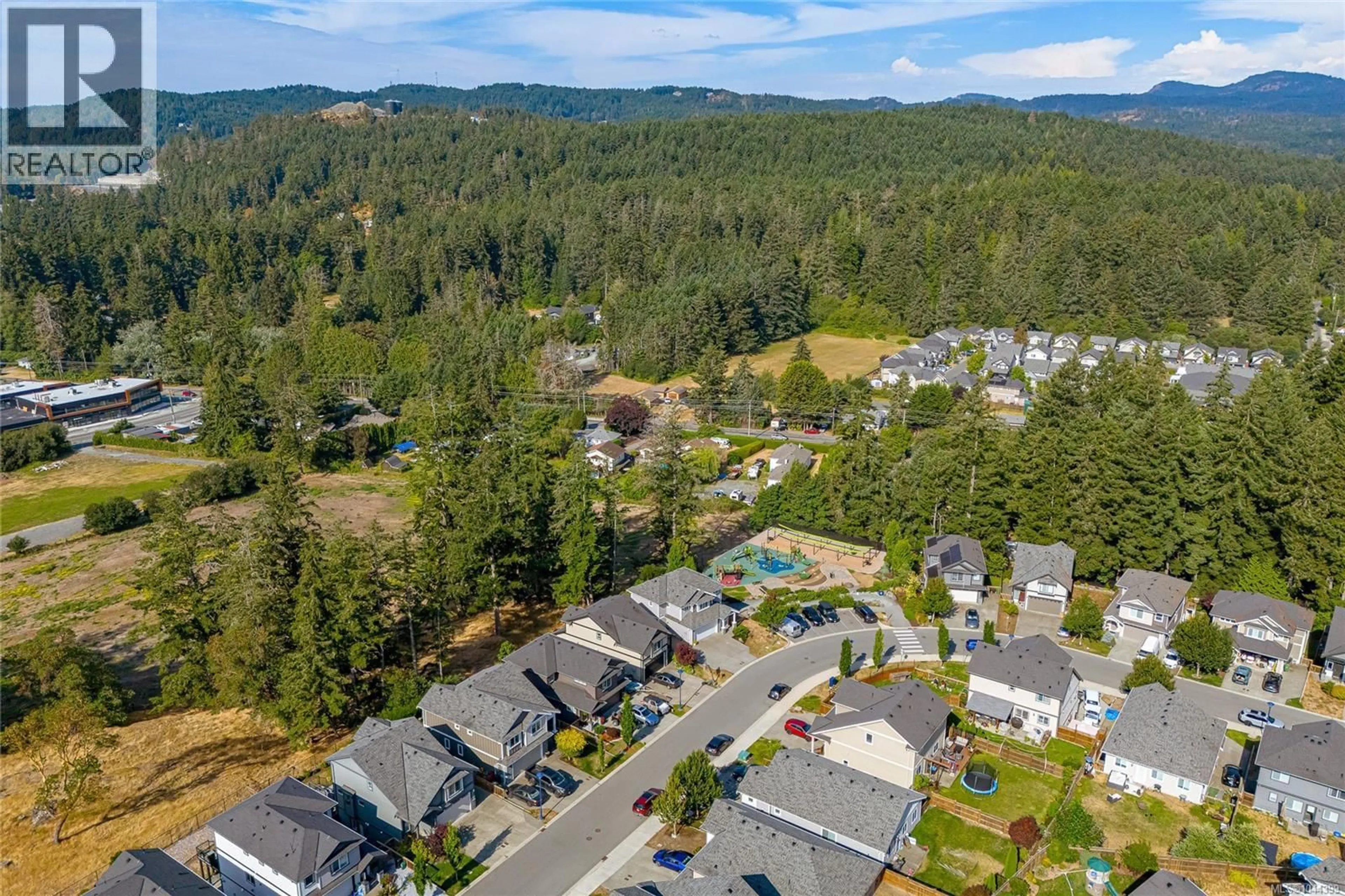 A pic from outside/outdoor area/front of a property/back of a property/a pic from drone, forest/trees view for 3568 HONEYCRISP AVENUE, Langford British Columbia V9C0N5