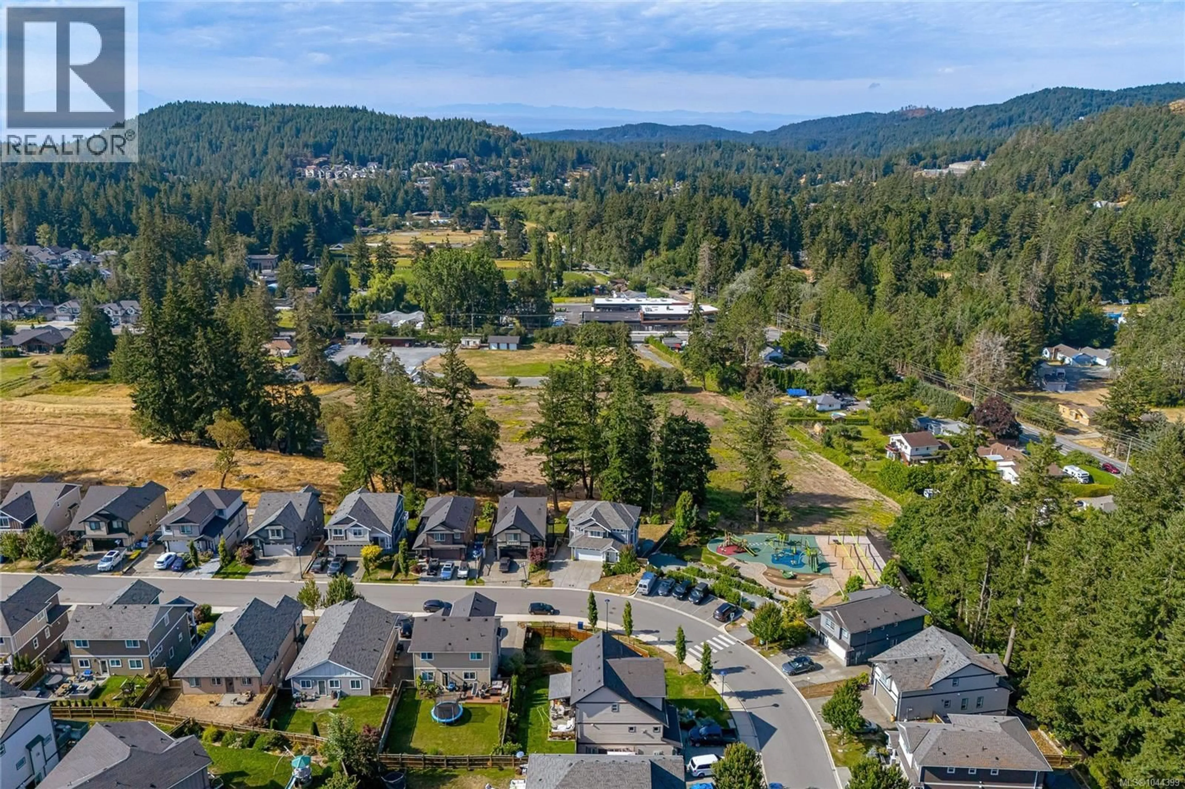 A pic from outside/outdoor area/front of a property/back of a property/a pic from drone, mountain view for 3568 HONEYCRISP AVENUE, Langford British Columbia V9C0N5