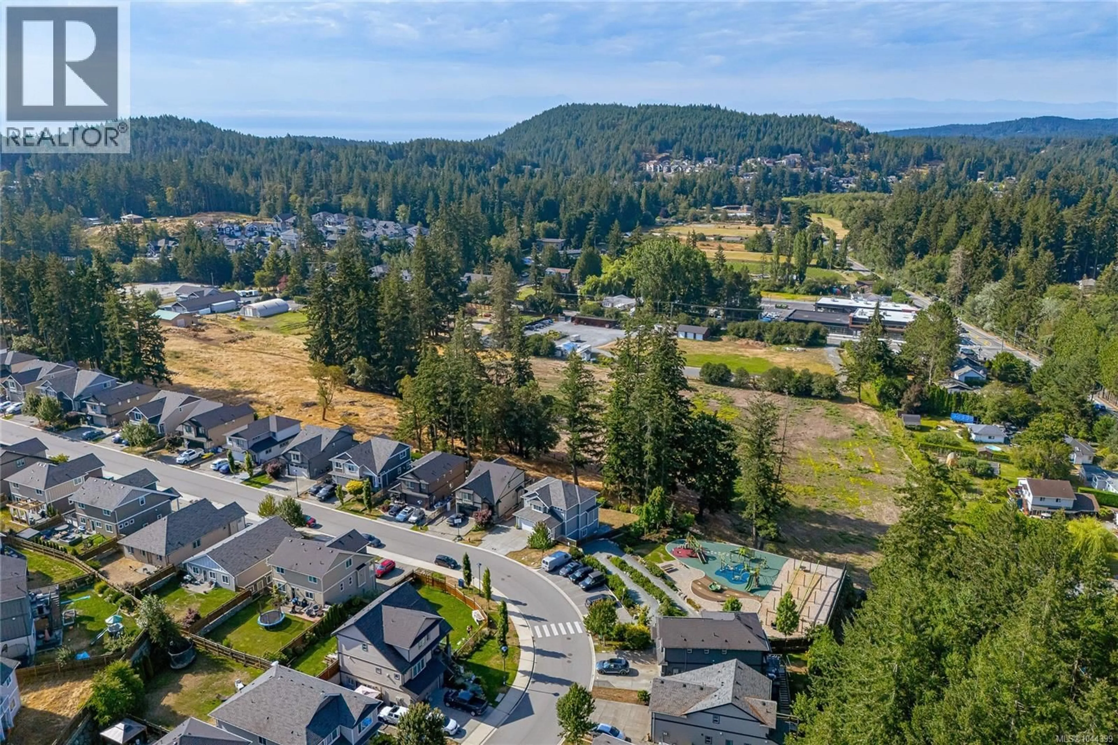 A pic from outside/outdoor area/front of a property/back of a property/a pic from drone, mountain view for 3568 HONEYCRISP AVENUE, Langford British Columbia V9C0N5