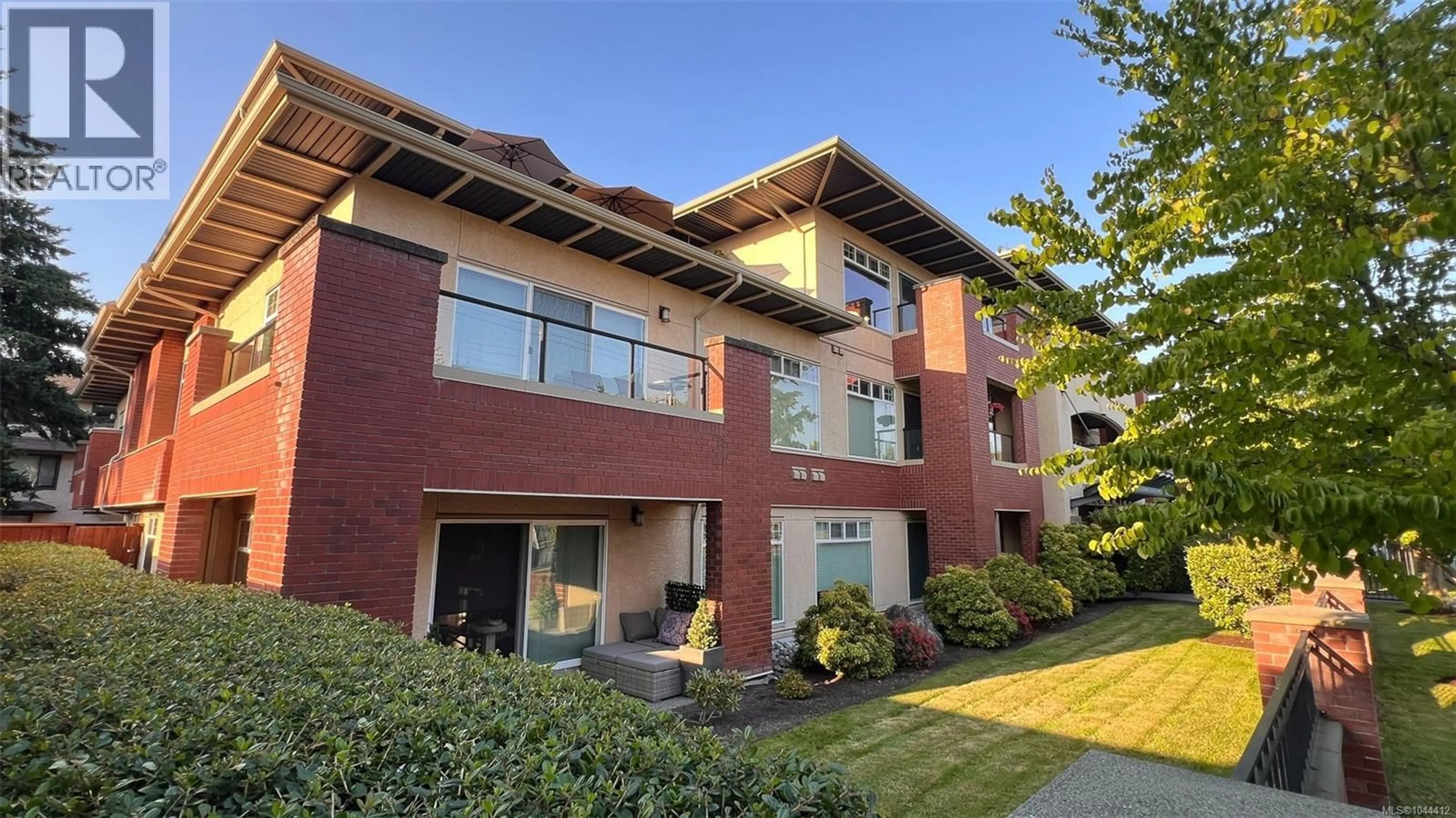 Home with brick exterior material, building for 202 - 2380 BRETHOUR AVENUE, Sidney British Columbia V8L2A5