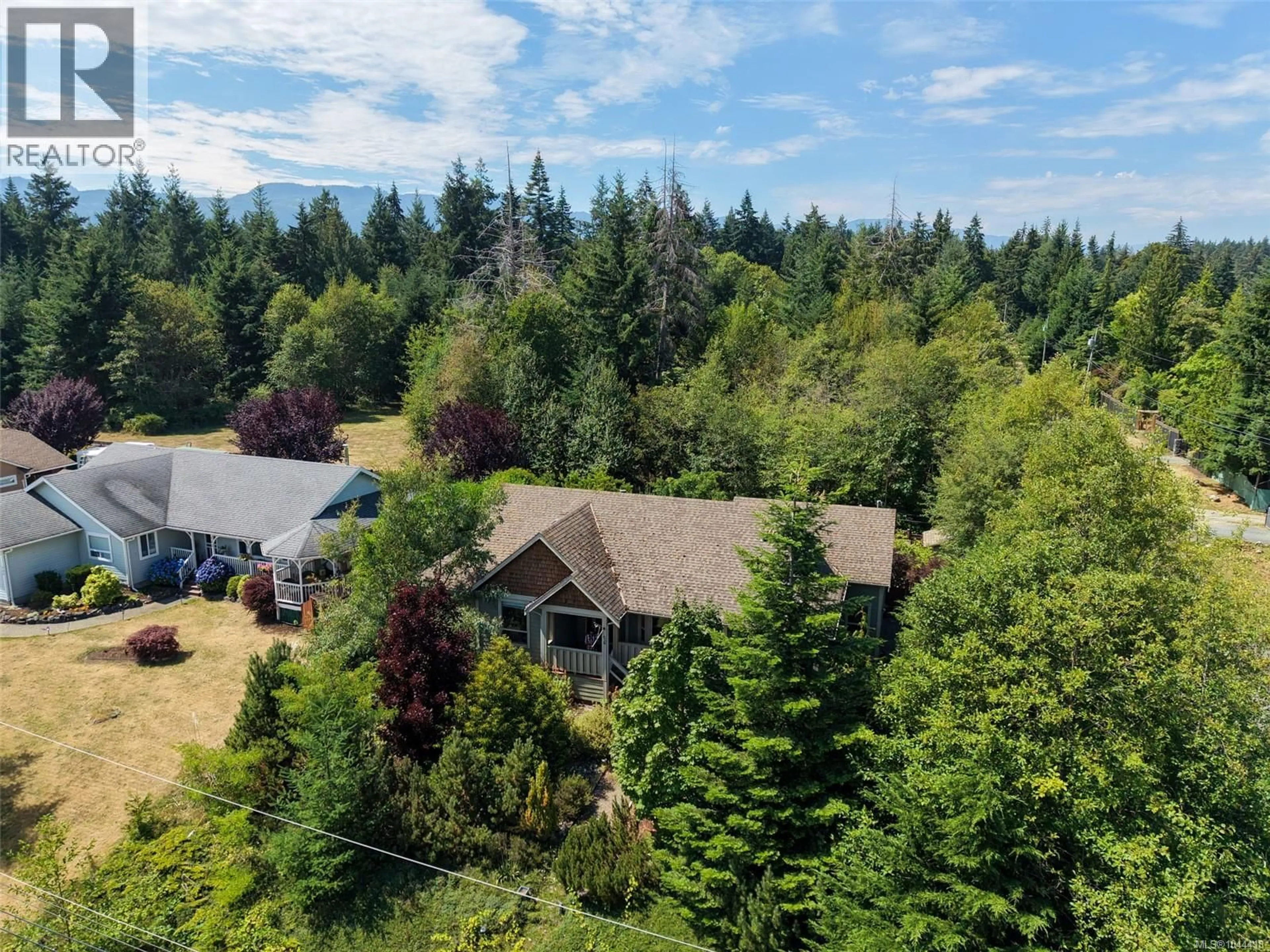 A pic from outside/outdoor area/front of a property/back of a property/a pic from drone, forest/trees view for 126 BAYRIDGE PLACE, Bowser British Columbia V0R1G0