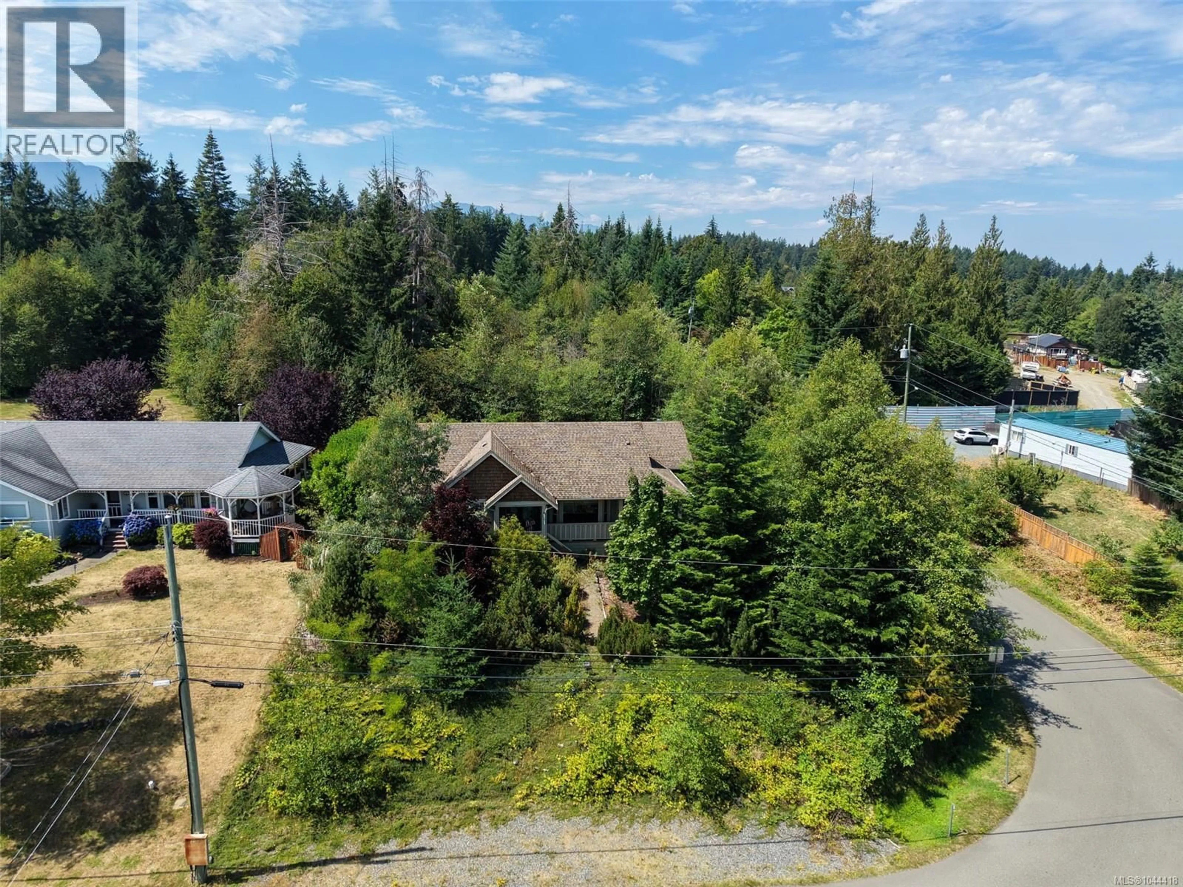 A pic from outside/outdoor area/front of a property/back of a property/a pic from drone, forest/trees view for 126 BAYRIDGE PLACE, Bowser British Columbia V0R1G0