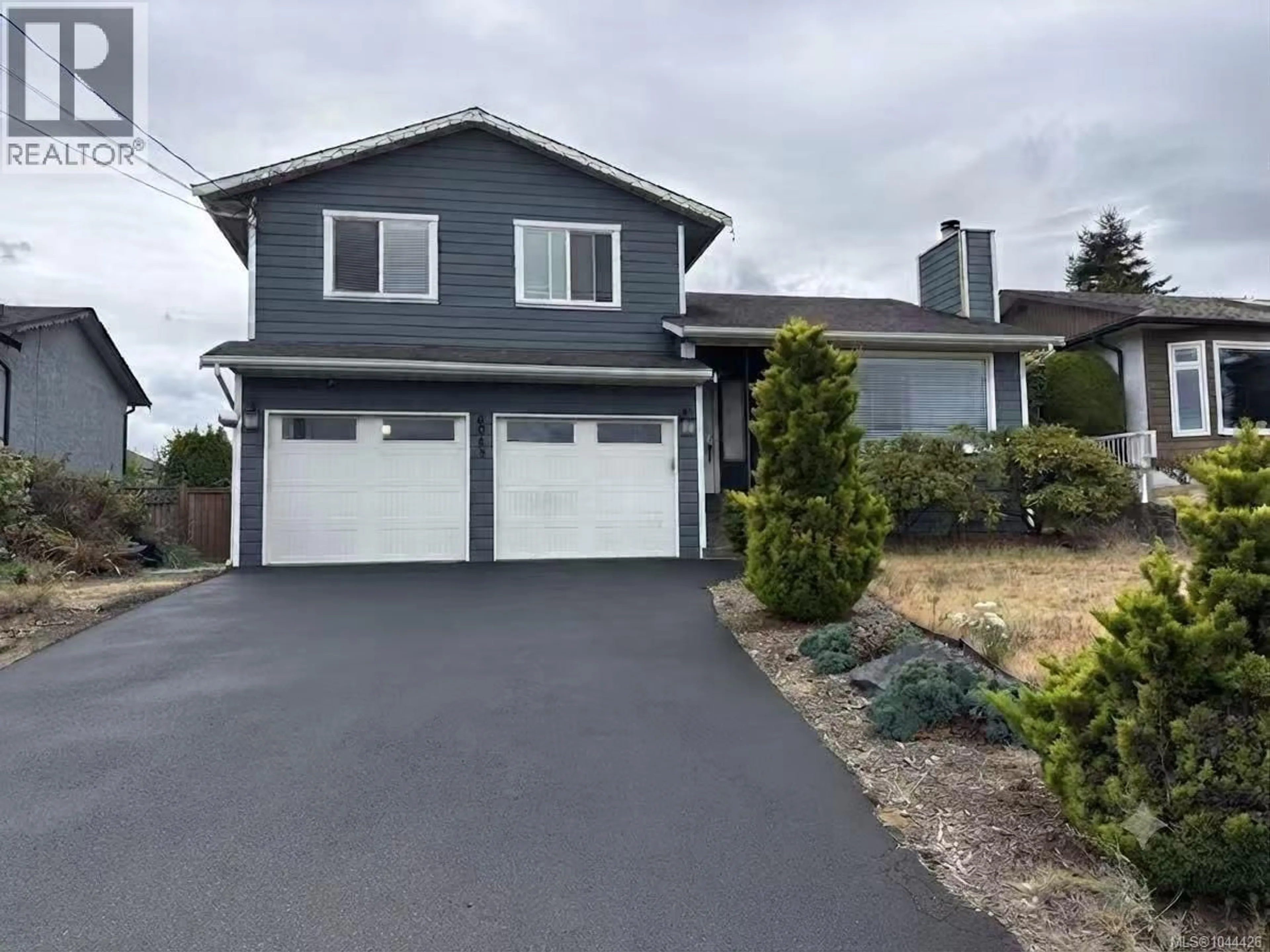 Home with vinyl exterior material, street for 6063 WALDBANK ROAD, Nanaimo British Columbia V9V1C7